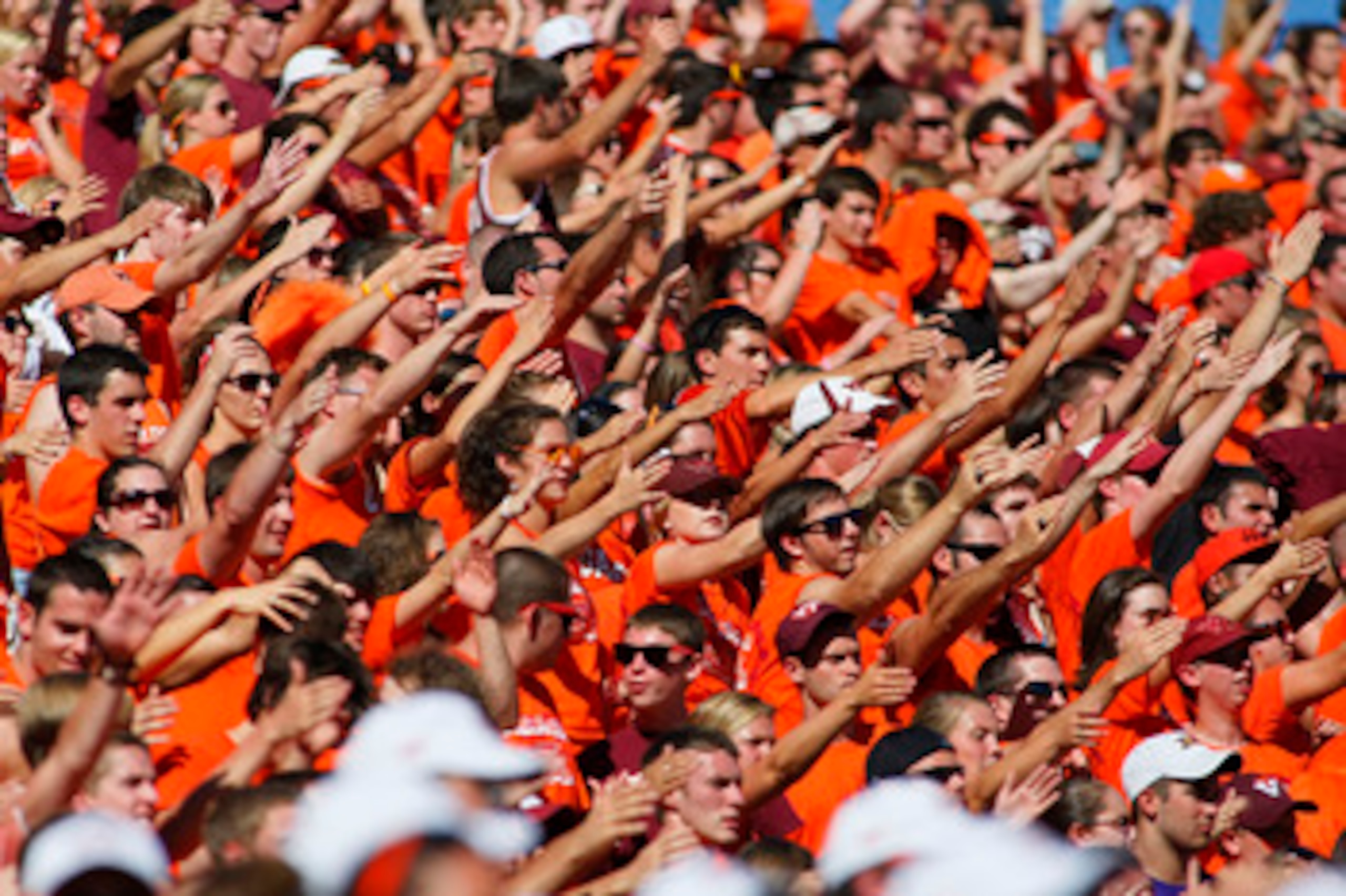 BLACKSBURG, VA - SEPTEMBER 18: Virginia Tech Hokies fans cheer against the East Carolina Pirates at Lane Stadium on September 18, 2010 in Blacksburg, Virginia.  (Photo by Geoff Burke/Getty Images)