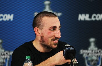 BOSTON, MA - MAY 23:  Brad Marchand #63 of the Boston Bruins speaks to the media after their 3 to 1 win over the Tampa Bay Lightning in Game Five of the Eastern Conference Finals during the 2011 NHL Stanley Cup Playoffs at TD Garden on May 23, 2011 in Bos