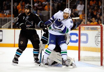 SAN JOSE, CA - MAY 20:  Raffi Torres #13 of the Vancouver Canucks screens goaltender Antti Niemi #31 of the San Jose Sharks as Niclas Wallin #7 of the San Jose Sharks looks on in the second period in Game Three of the Western Conference Finals during the 