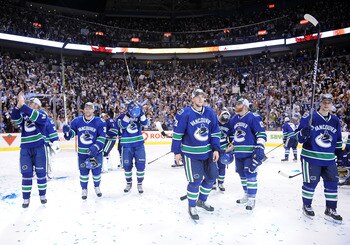 VANCOUVER, CANADA - MAY 24:  Henrik Sedin #33, Jannik Hansen #36, Maxim Lapierre #40, Alex Edler #23, Raffi Torres #13 and Mason Raymond #21 of the Vancouver Canucks acknowledge the fans after the  Canucks defeated the San Jose Sharks 3-2 in double-overti