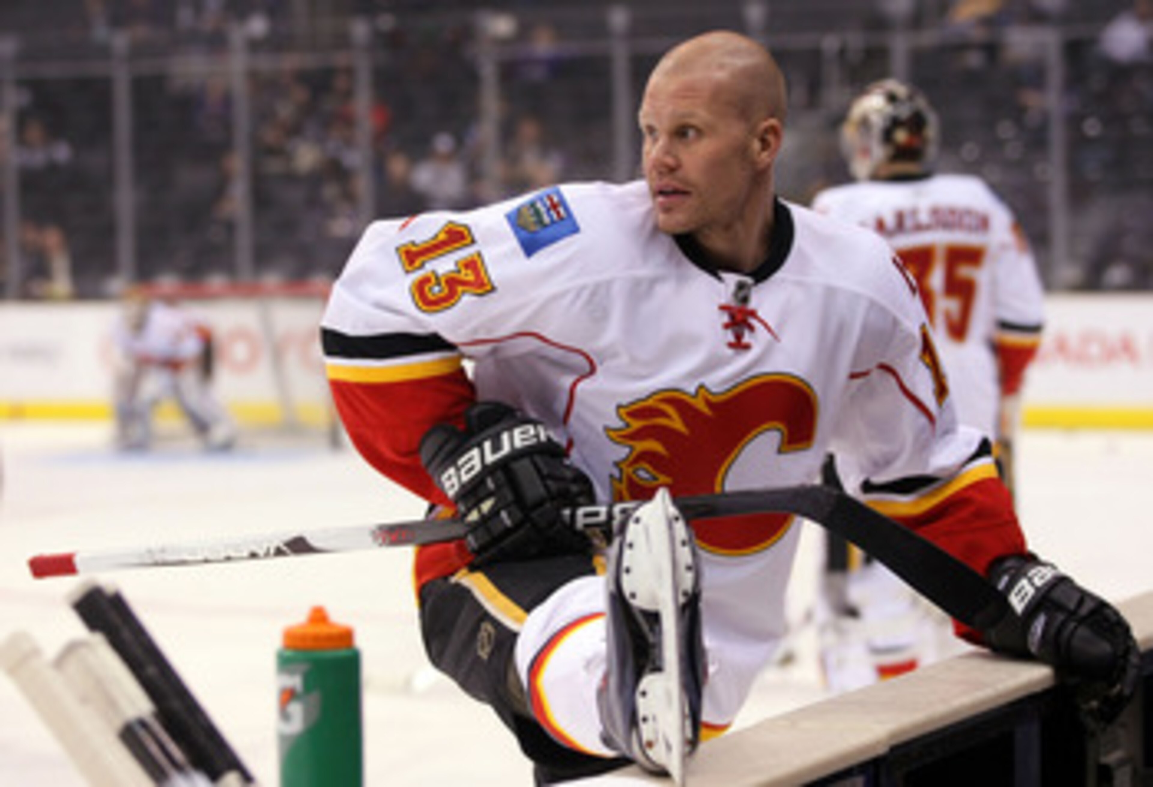 LOS ANGELES, CA - MARCH 21: Olli Jokinen #13 of the Calgary Flames stretches during warm-up prior to their NHL game against the Los Angeles Kings at Staples Center on March 21, 2011 in Los Angeles, California. The Kings defeated the Flames 2-1 in shootou LOS ANGELES, CA - MARCH 21: Olli Jokinen #13 of the Calgary Flames stretches during warm-up prior to their NHL game against the Los Angeles Kings at Staples Center on March 21, 2011 in Los Angeles, California. The Kings defeated the Flames 2-1 in shootou