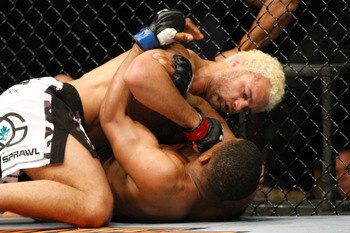 MONTREAL- MAY 8: Josh Koscheck (top) punches Paul Daley in their welter weight bout at UFC 113 at Bell Centre on May 8, 2010 in Montreal, Quebec, Canada.  (Photo by Richard Wolowicz/Getty Images)