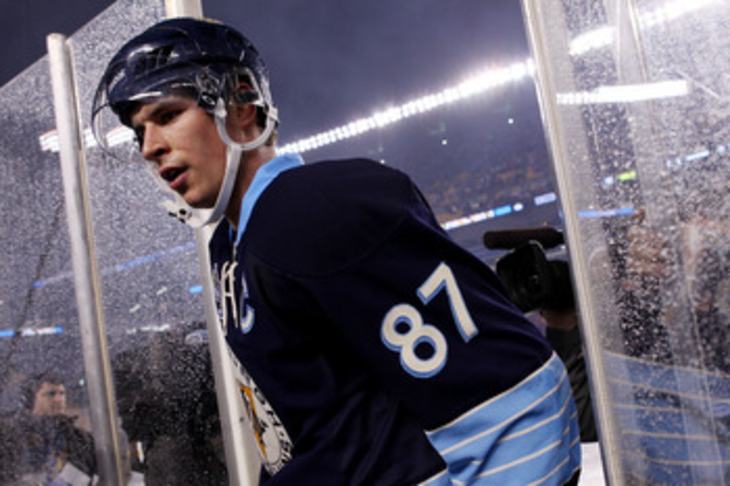 PITTSBURGH, PA - JANUARY 01:  Sidney Crosby #87 of the Pittsburgh Penguins walks off the ice after being defeated 3-1 by the Washington Capitals during the 2011 NHL Bridgestone Winter Classic at Heinz Field on January 1, 2011 in Pittsburgh, Pennsylvania.