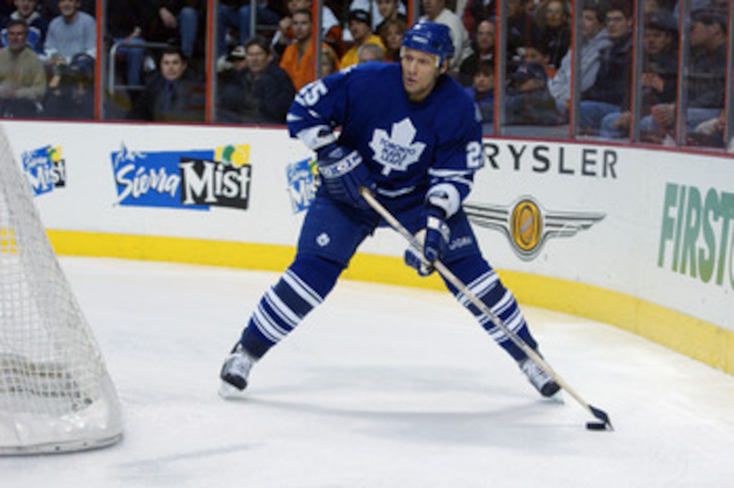 PHILADELPHIA - APRIL 9:  Jyrki Lumme #25 of the Toronto Maple Leafs skates with the puck during game one of the Eastern Conference quarterfinals of the 2003 Stanley Cup playoffs against the Philadelphia Flyers at The First Union Center on April 9, 2003 in