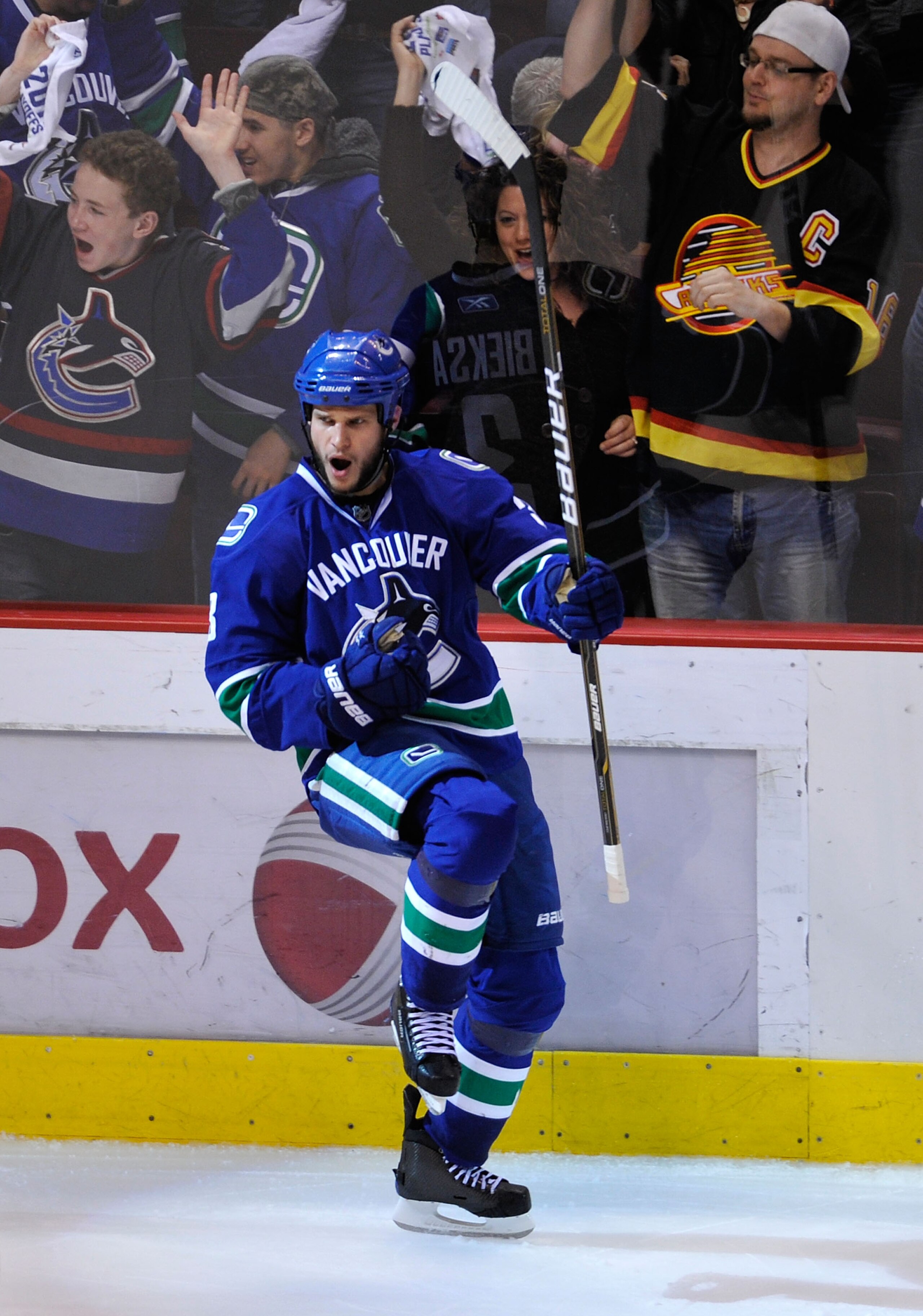 VANCOUVER, BC - MAY 15:  Kevin Bieksa #3 of the Vancouver Canucks celebrates his third period goal to tie the game at 2-2 against the San Jose Sharks in Game One of the Western Conference Finals during the 2011 Stanley Cup Playoffs at Rogers Arena on May