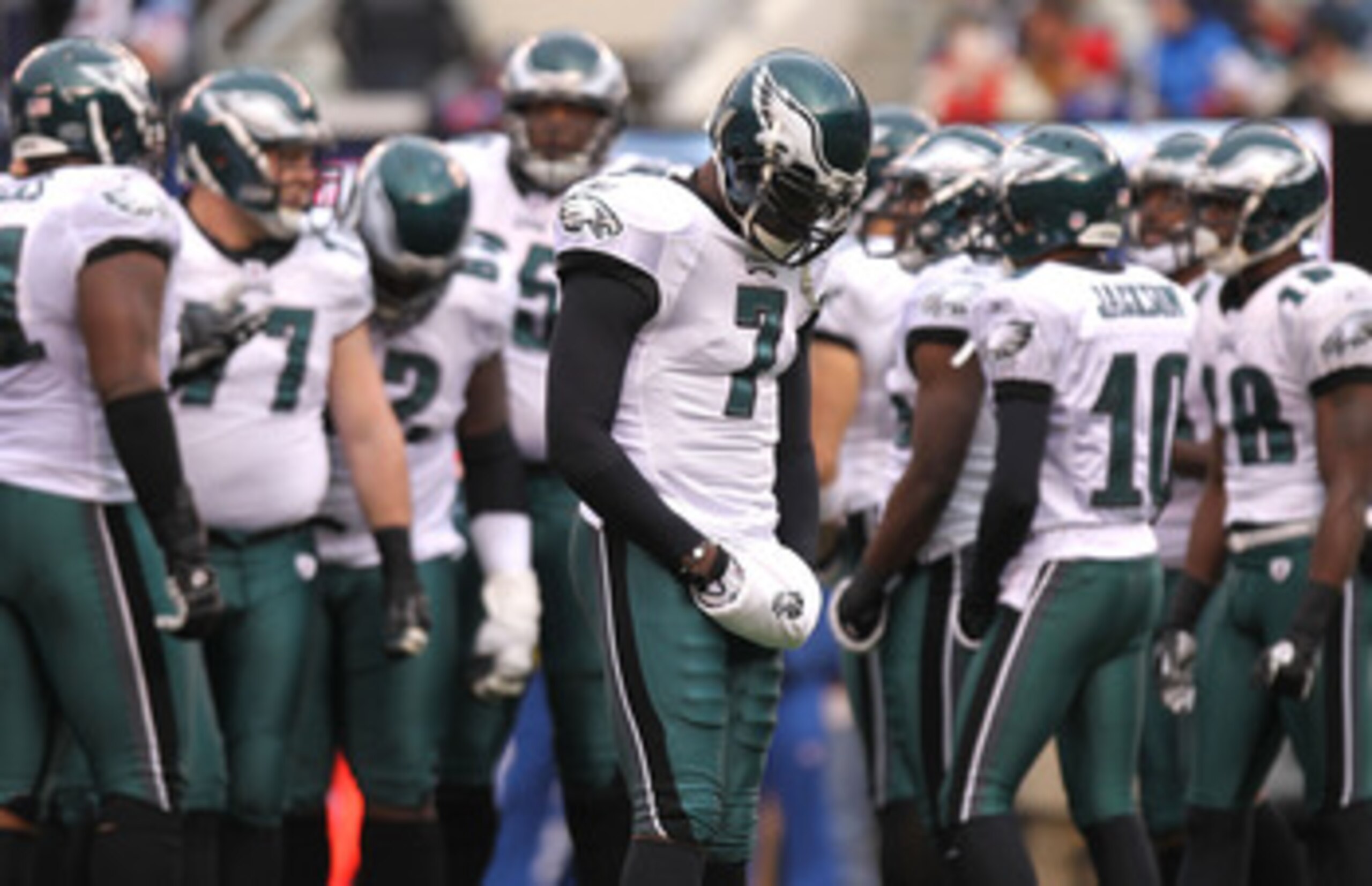 EAST RUTHERFORD, NJ - DECEMBER 19:  Michael Vick #7 of the Philadelphia Eagles stands by the huddle against the New York Giants at New Meadowlands Stadium on December 19, 2010 in East Rutherford, New Jersey.  (Photo by Nick Laham/Getty Images)