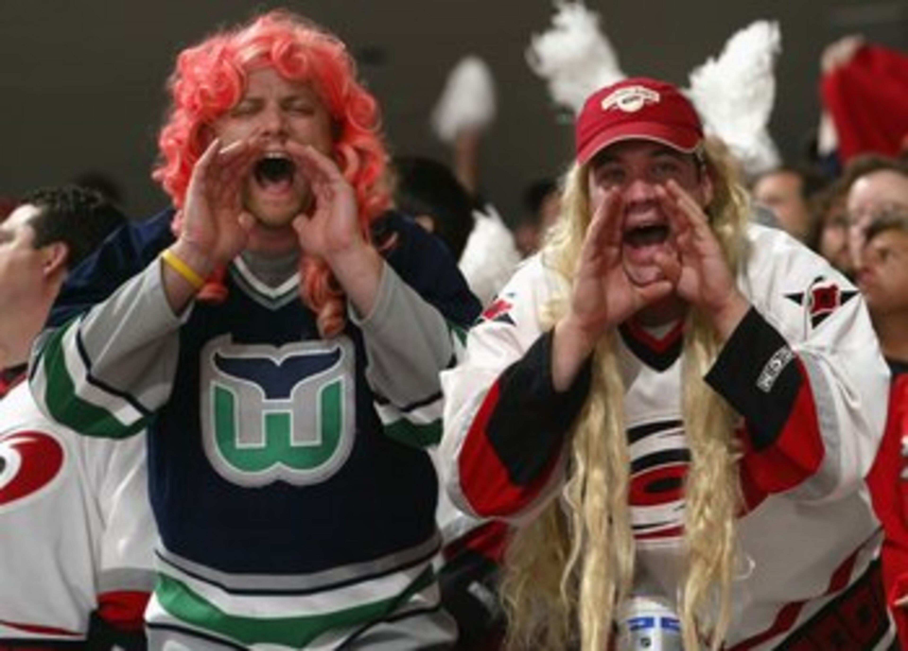 RALEIGH, NC - JUNE 14:  Fans of the Carolina Hurricanes cheer during game five of the 2006 NHL Stanley Cup Finals against the Edmonton Oilers on June 14, 2006 at the RBC Center in Raleigh, North Carolina.  (Photo by Dave Sandford/Getty Images)
