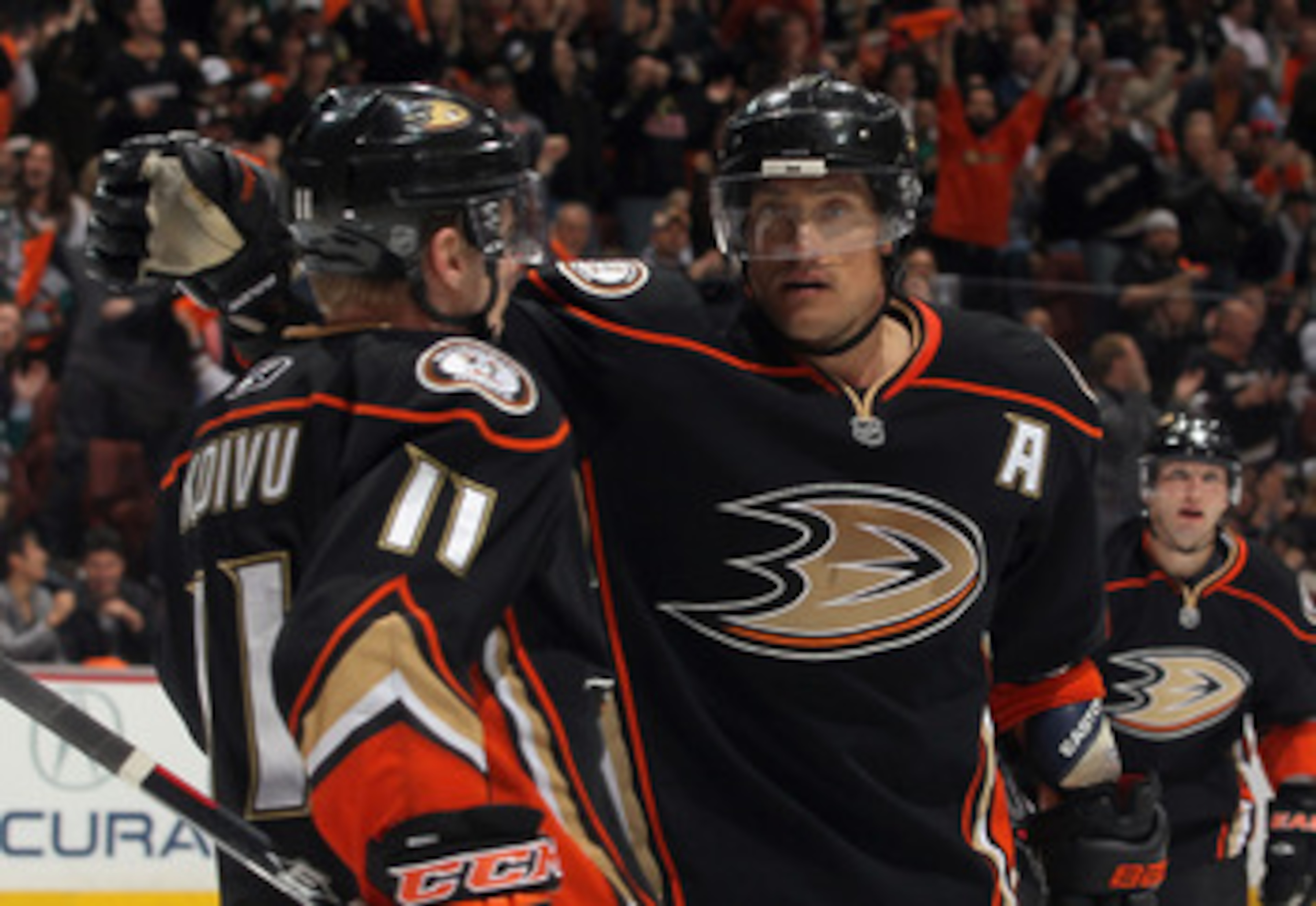 ANAHEIM, CA - APRIL 13: Saku Koivu #11 and Teemu Selanne #8 of the Anaheim Ducks celebrate Selanne's third period goal against the Nashville Predators in Game One of the Western Conference Quarterfinals during the 2011 NHL Stanley Cup Playoffs at Honda C ANAHEIM, CA - APRIL 13: Saku Koivu #11 and Teemu Selanne #8 of the Anaheim Ducks celebrate Selanne's third period goal against the Nashville Predators in Game One of the Western Conference Quarterfinals during the 2011 NHL Stanley Cup Playoffs at Honda C