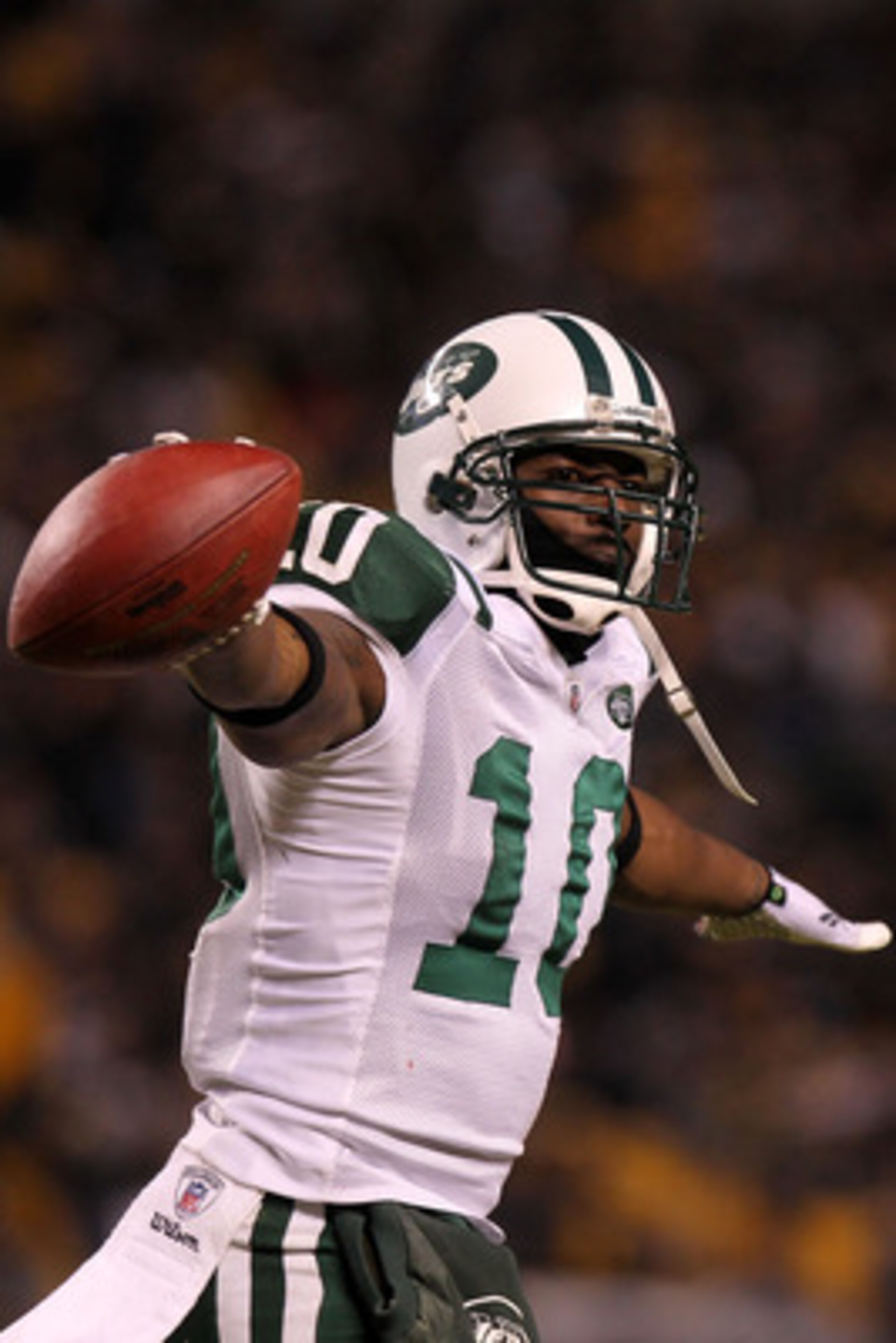 PITTSBURGH, PA - JANUARY 23: Santonio Holmes #10 of the New York Jets celebrates after he scored a third quarter touchdown against the Pittsburgh Steelers during the 2011 AFC Championship game at Heinz Field on January 23, 2011 in Pittsburgh, Pennsylvani PITTSBURGH, PA - JANUARY 23: Santonio Holmes #10 of the New York Jets celebrates after he scored a third quarter touchdown against the Pittsburgh Steelers during the 2011 AFC Championship game at Heinz Field on January 23, 2011 in Pittsburgh, Pennsylvani