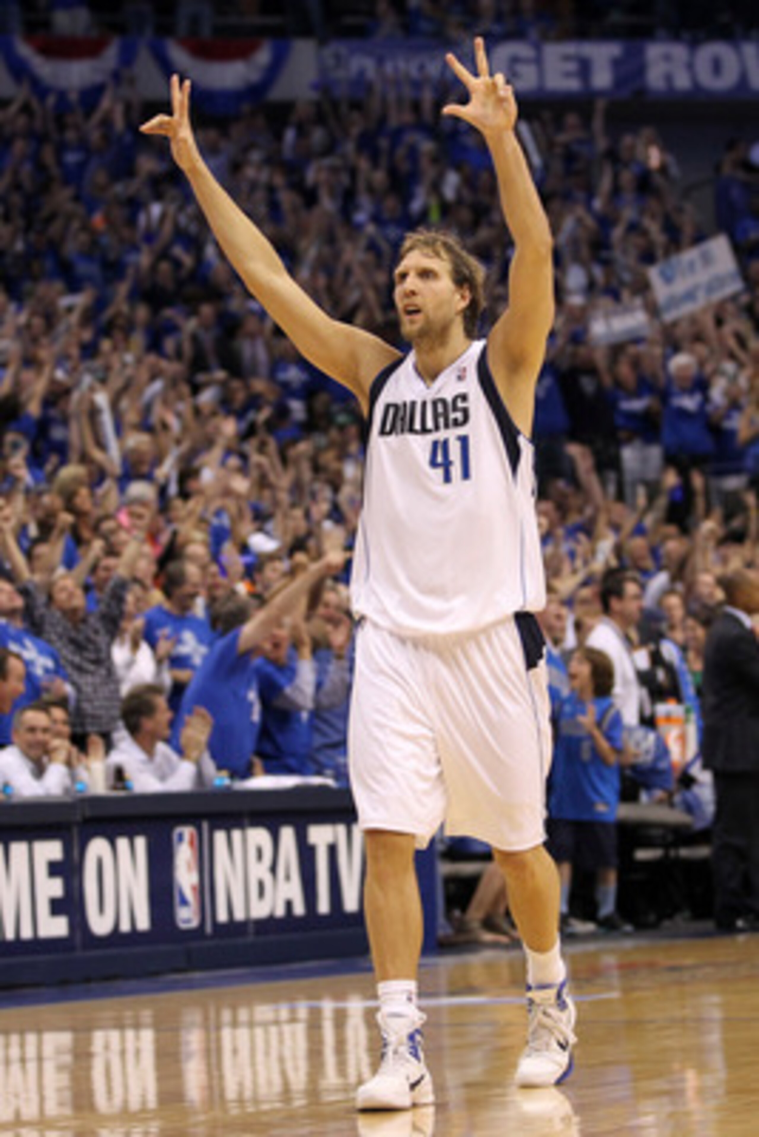 DALLAS, TX - MAY 25:  Dirk Nowitzki #41 of the Dallas Mavericks reacts after making a three-pointer in the fourth quarter while taking on the Oklahoma City Thunder in Game Five of the Western Conference Finals during the 2011 NBA Playoffs at American Airl