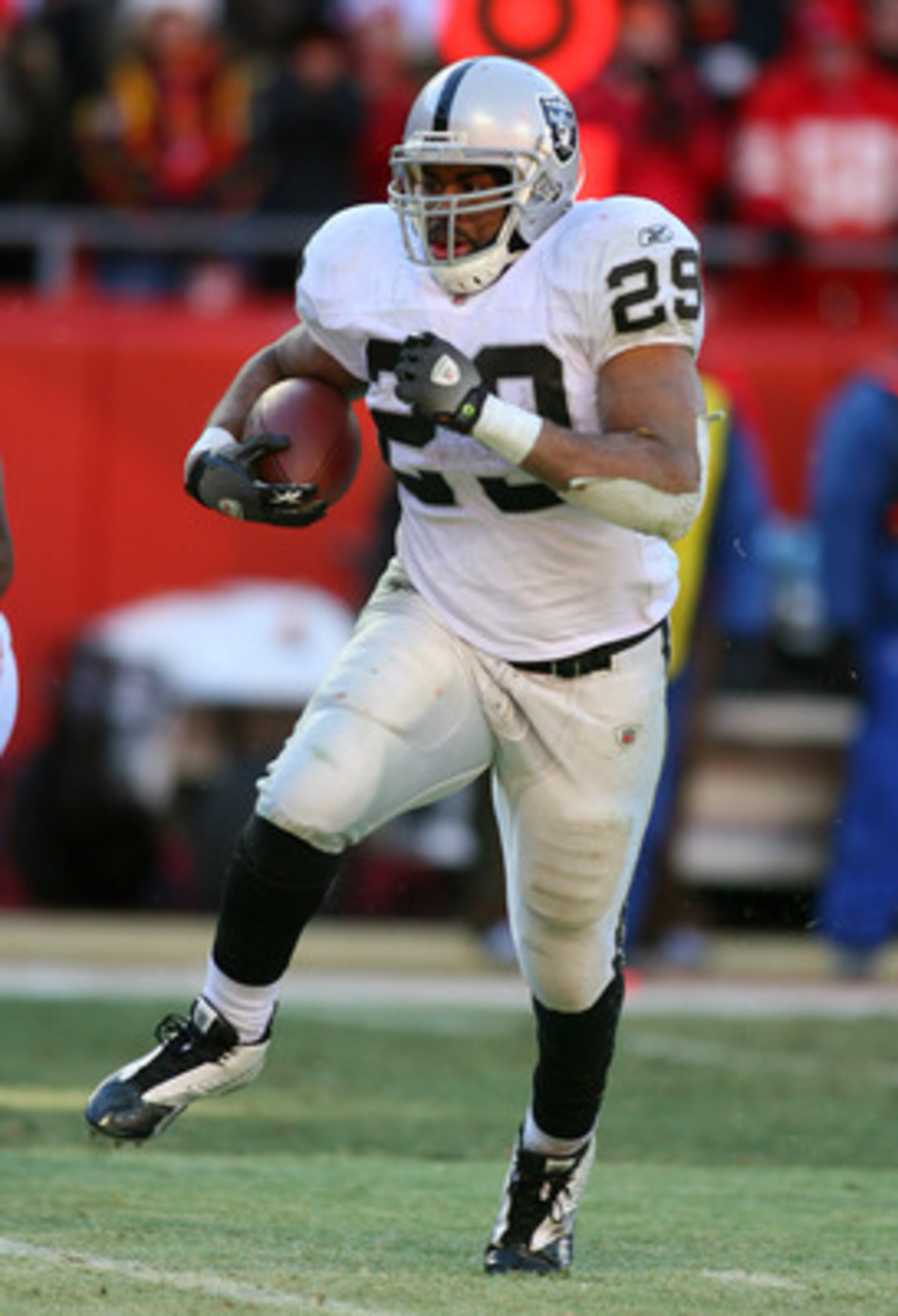 KANSAS CITY, MO - JANUARY 02: Running back Michael Bush #29 of the Oakland Raiders runs down field in a game against the Kansas City Chiefs at Arrowhead Stadium on January 2, 2011 in Kansas City, Missouri. (Photo by Tim Umphrey/Getty Images) KANSAS CITY, MO - JANUARY 02: Running back Michael Bush #29 of the Oakland Raiders runs down field in a game against the Kansas City Chiefs at Arrowhead Stadium on January 2, 2011 in Kansas City, Missouri. (Photo by Tim Umphrey/Getty Images)