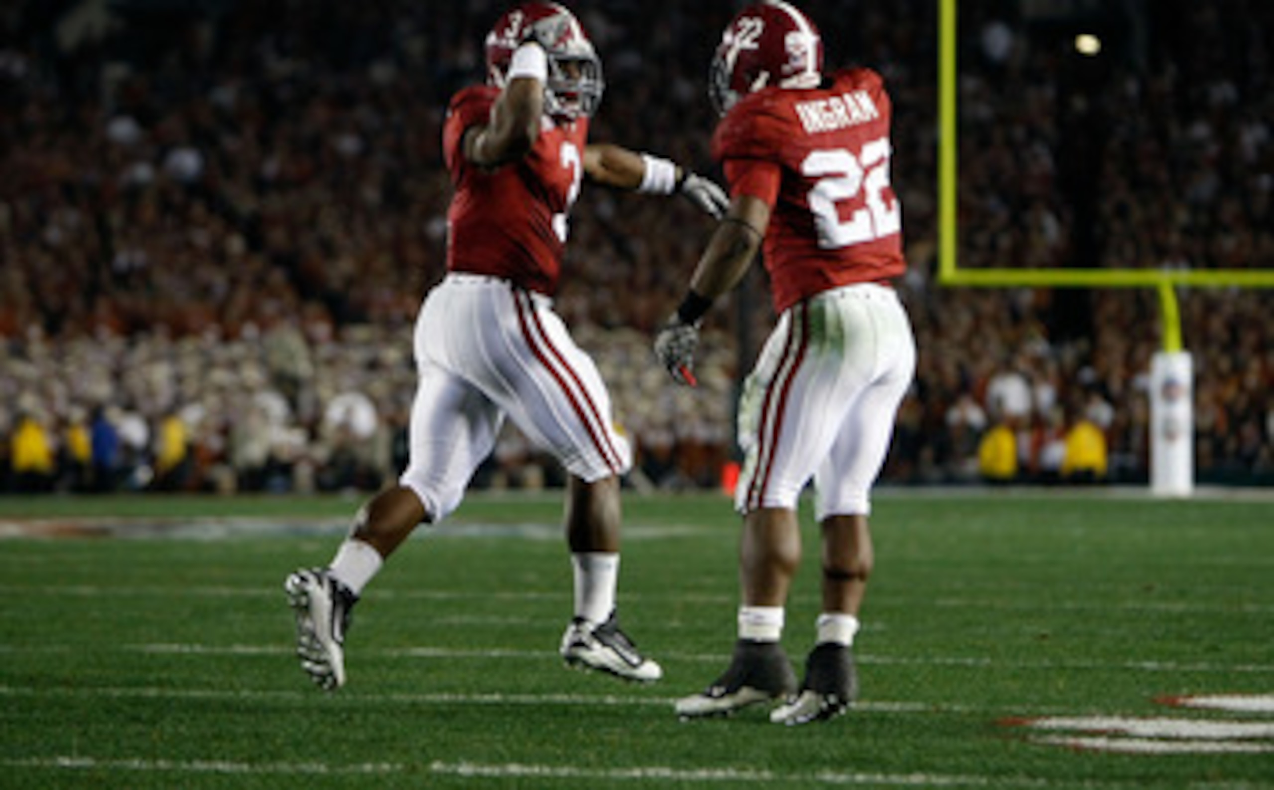 PASADENA, CA - JANUARY 07:  Running back Trent Richardson #3 of the Alabama Crimson Tide celebrates with Mark Ingram #22 after Richardson  runs for a 49-yard touchdown against the Texas Longhorns in the second quarter of the Citi BCS National Championship