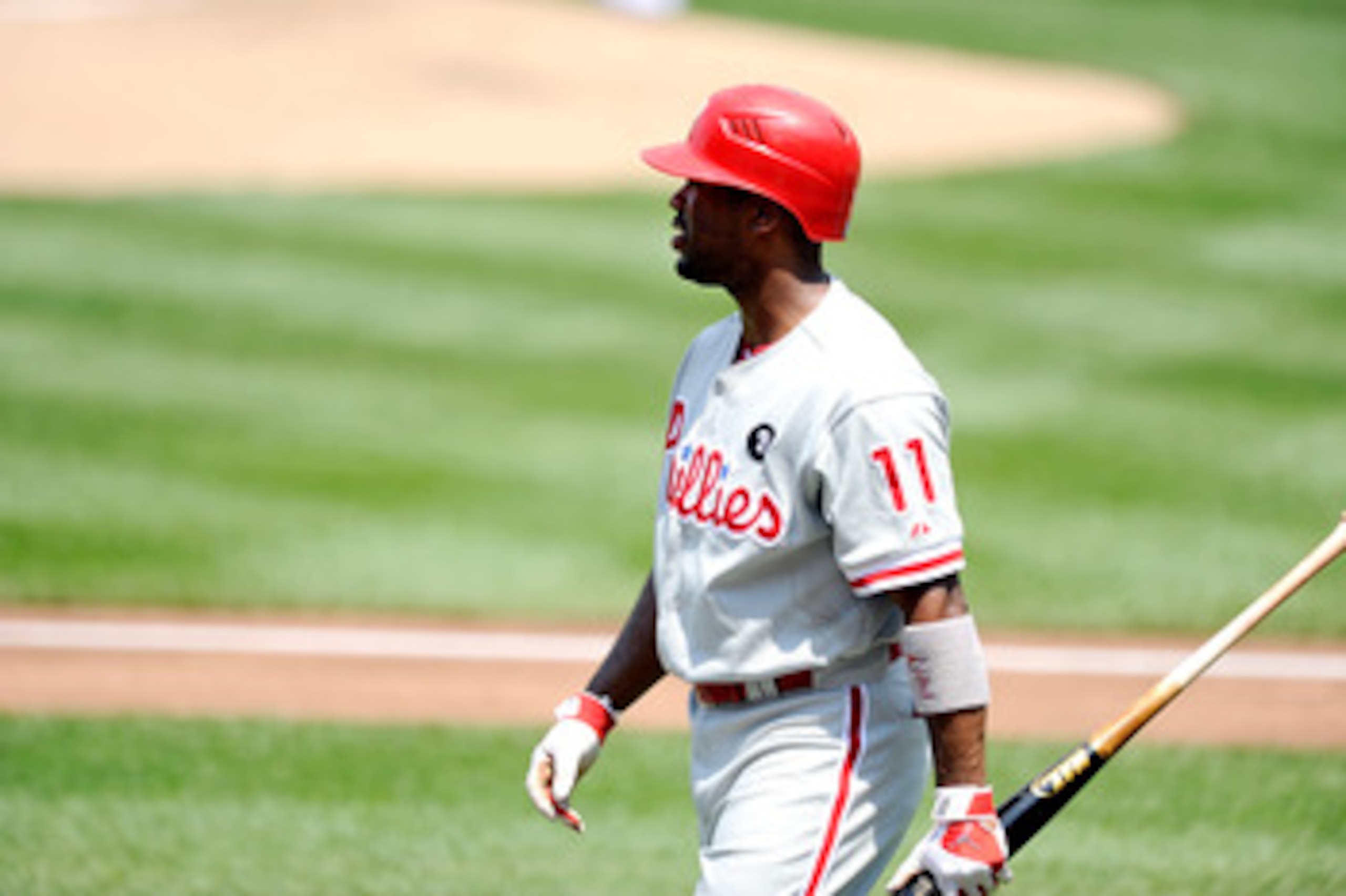 WASHINGTON, DC - MAY 30:  Jimmy Rollins #11 of the Philadelphia Phillies walks to the dugout after striking out against the Washington Nationals at Nationals Park on May 30, 2011 in Washington, DC.  (Photo by Greg Fiume/Getty Images)