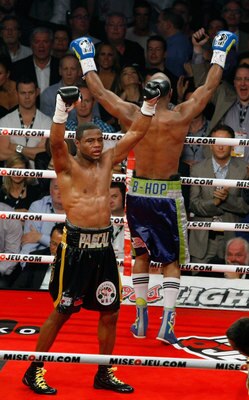 MONTREAL, CANADA - MAY 21:  Both Bernard Hopkins and Jean Pascal raise their hands in victory after twelve rounds of action during the WBC Light-Heavyweight Championship fight between Bernard Hopkins and Jean Pascal at the Bell Centre on May 22, 2011 in M