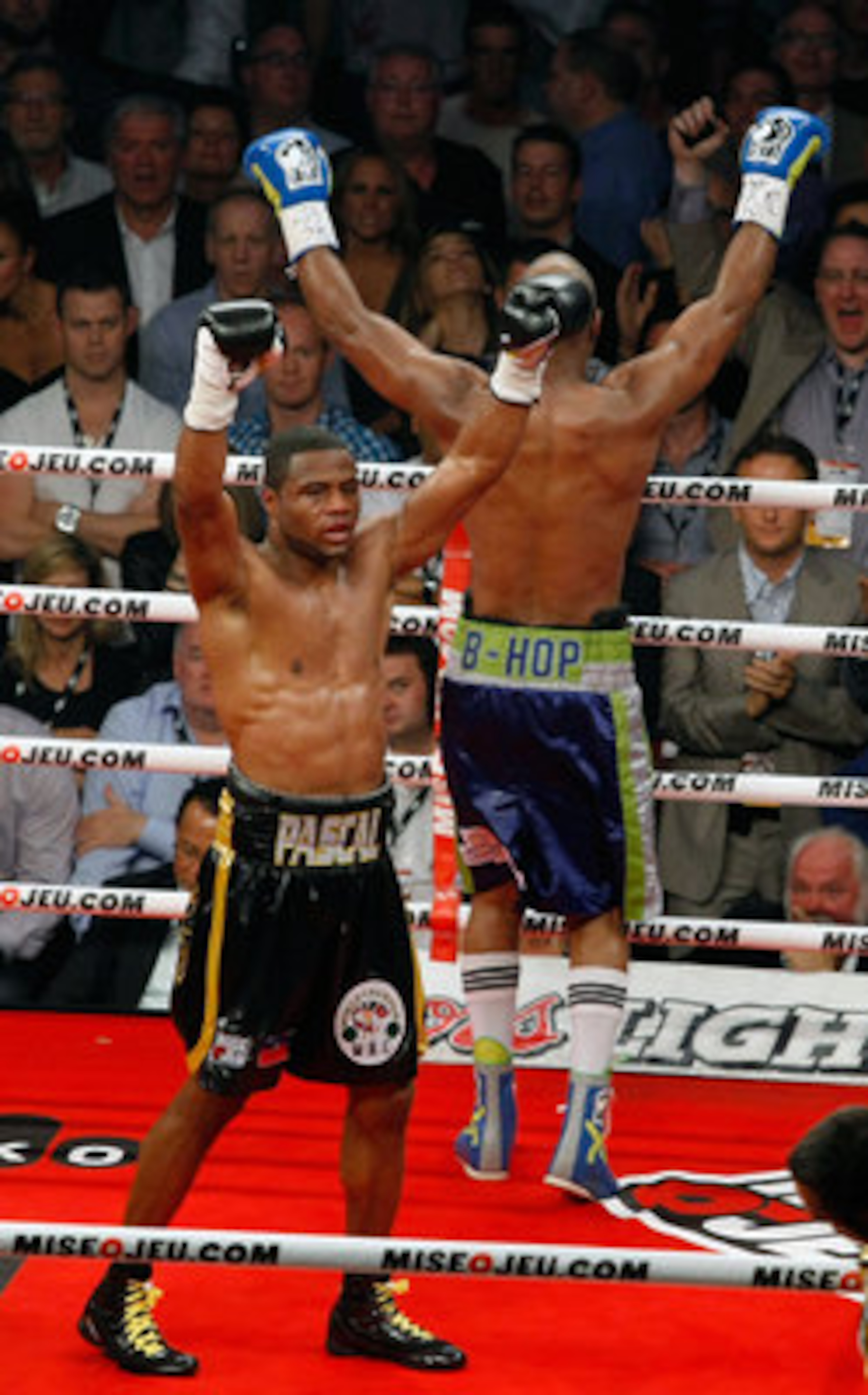 MONTREAL, CANADA - MAY 21:  Both Bernard Hopkins and Jean Pascal raise their hands in victory after twelve rounds of action during the WBC Light-Heavyweight Championship fight between Bernard Hopkins and Jean Pascal at the Bell Centre on May 22, 2011 in M