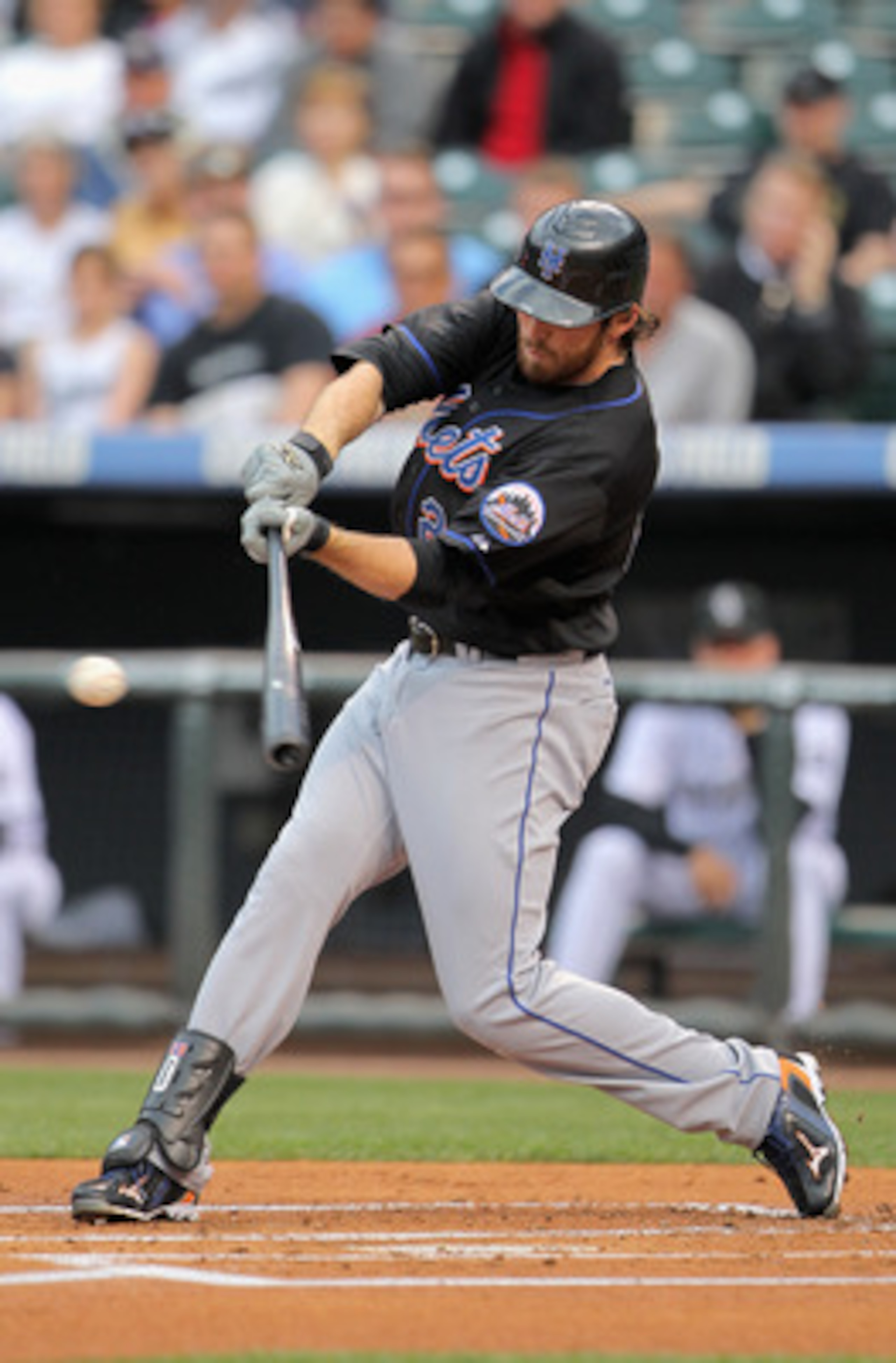 DENVER, CO - MAY 10:  Ike Davis #29 of the New York Mets hits a two RBI single off of starting pitcher Jason Hammel #46 of the Colorado Rockies in the first inning at Coors Field on May 10, 2011 in Denver, Colorado.  (Photo by Doug Pensinger/Getty Images)