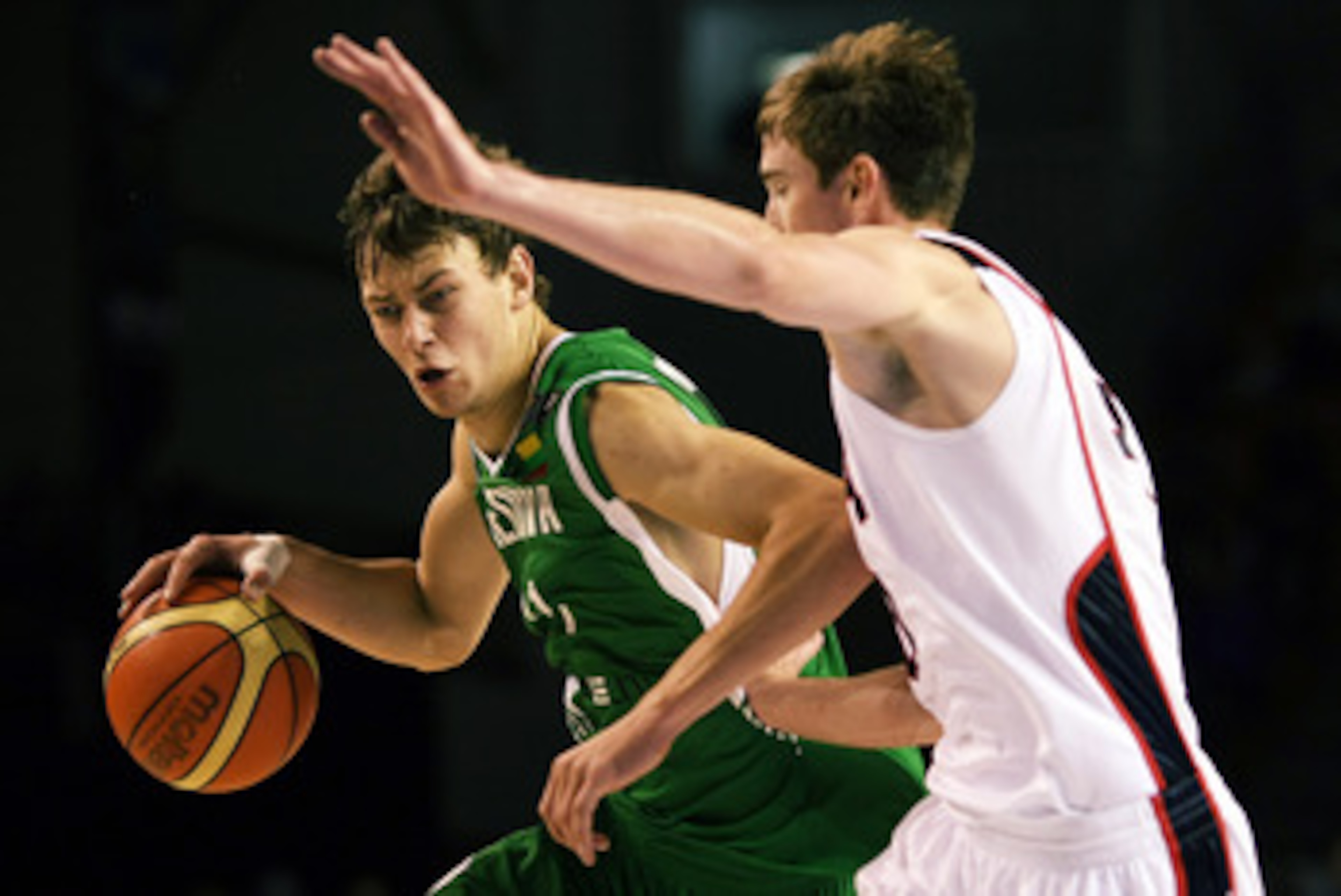 AUCKLAND, NEW ZEALAND - JULY 08: Donatas Motiejunas of Lithuania tries to get past Gordon Hayward of the United States defends during the U19 Basketball World Championships match between the United States and Lithuania at North Shore Events Centre on Jul AUCKLAND, NEW ZEALAND - JULY 08: Donatas Motiejunas of Lithuania tries to get past Gordon Hayward of the United States defends during the U19 Basketball World Championships match between the United States and Lithuania at North Shore Events Centre on Jul