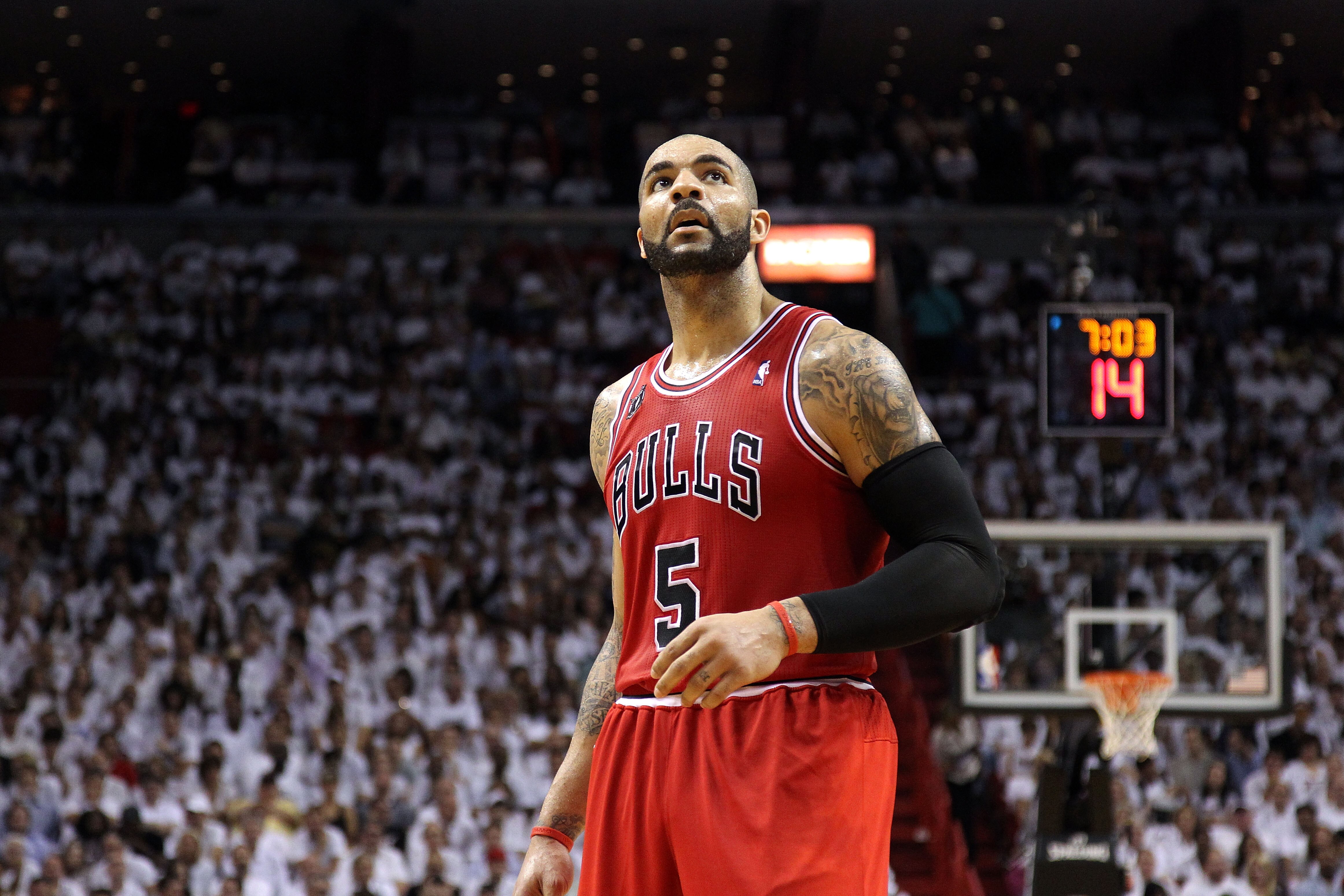 MIAMI, FL - MAY 24:  Carlos Boozer #5 of the Chicago Bulls looks on against the Miami Heat in Game Four of the Eastern Conference Finals during the 2011 NBA Playoffs on May 24, 2011 at American Airlines Arena in Miami, Florida. The Heat won 101-93 in over