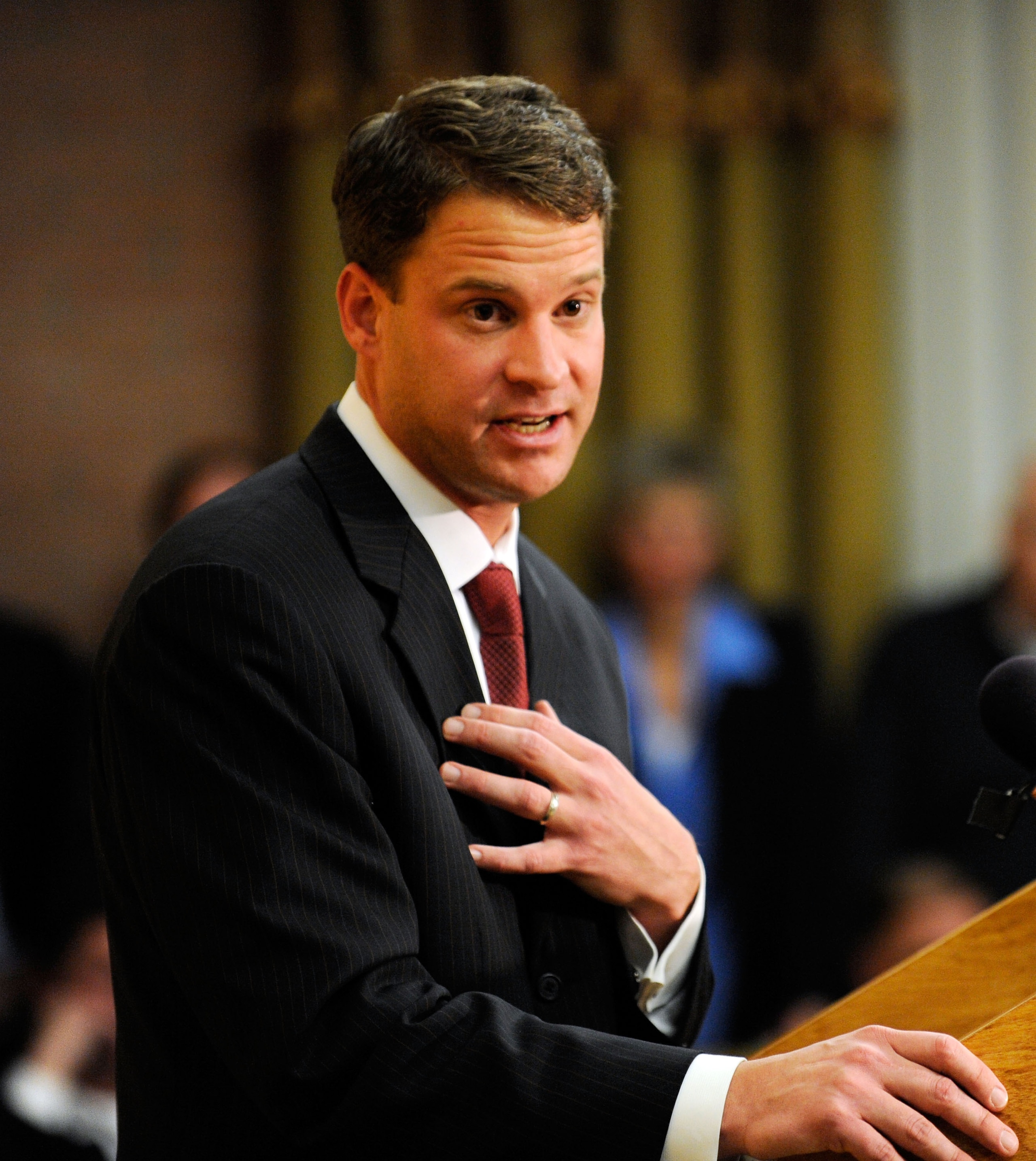 LOS ANGELES, CA - JANUARY 13:  Lane Kiffin (L)  the new college football coach of University of Southern California speaks during a news conference at Heritage Hall on the campus of USC on January 13, 2010 in Los Angeles, California.  (Photo by Kevork Dja