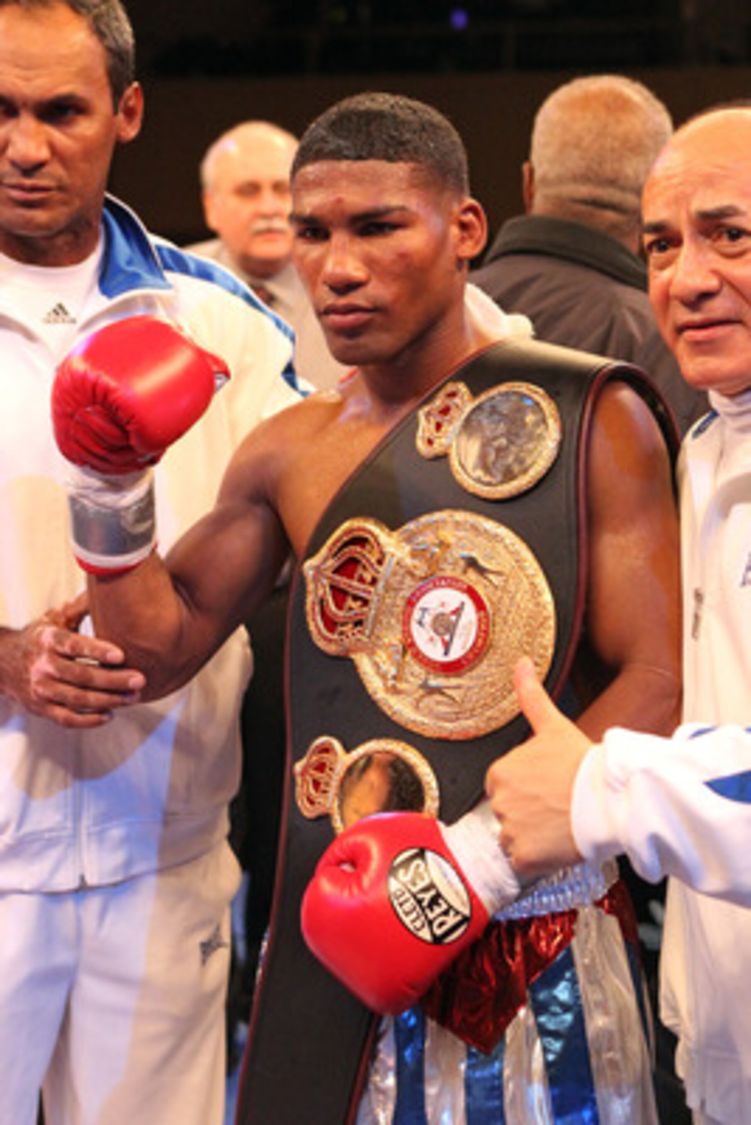 ATLANTIC CITY, NJ - MARCH 26: Yuriorkis Gamboa wears the championship belt after winning the IBF WBA World Featherweight title by beating Jorge Solis of Mexico during Top Rank's 'Featherweight Fury' on March 26, 2011 at Boardwalk Hall in Atlantic City, Ne