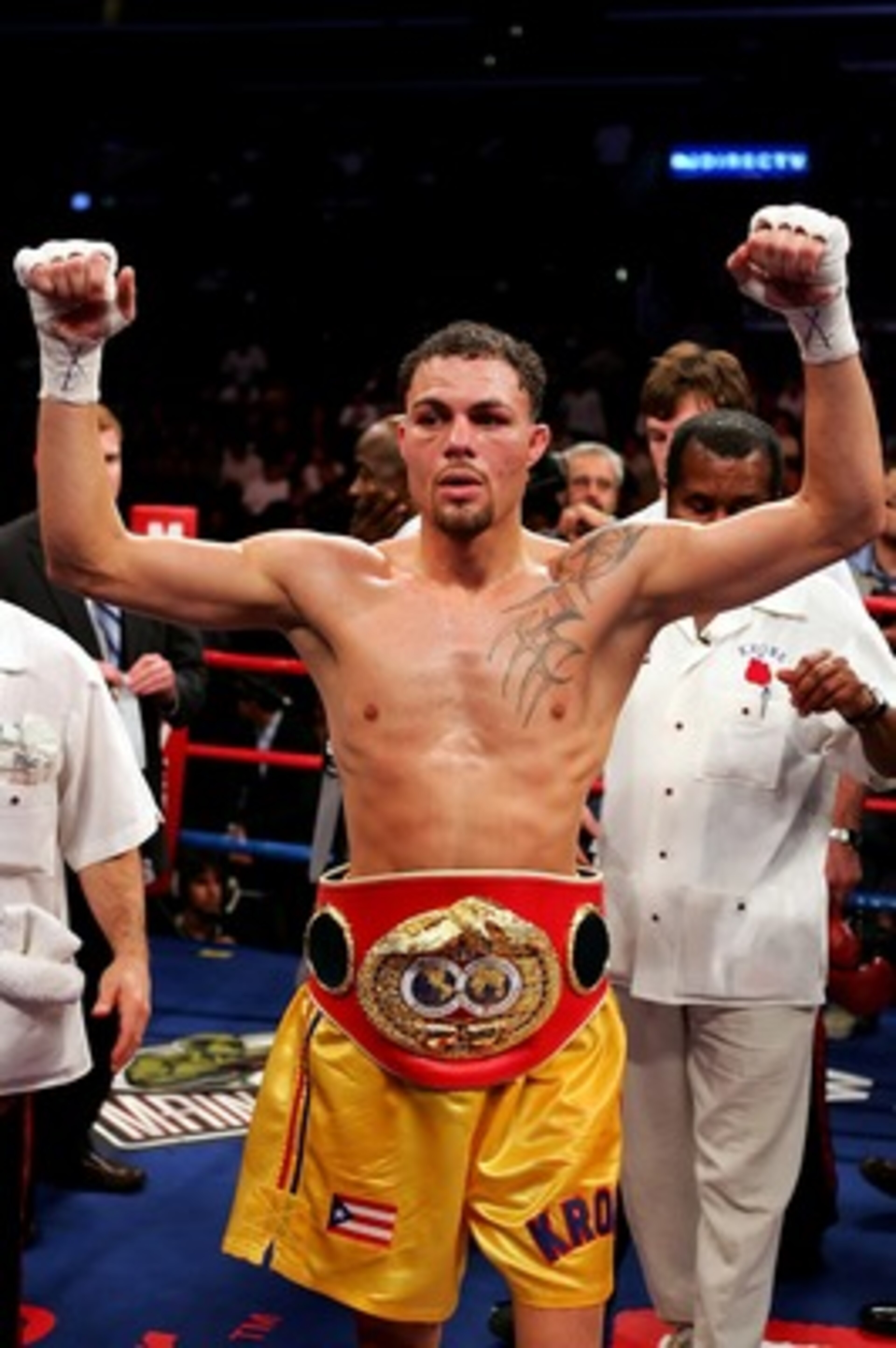 LOS ANGELES, CA - NOVEMBER 23:  Kermit Cintron celebrates his victory over Jesse Feliciano in the IBF Welterweight title fight at Staples Center on November 23, 2007 in Los Angeles, California.  Cintron won the fight by way of TKO in the 10th round.  (Pho