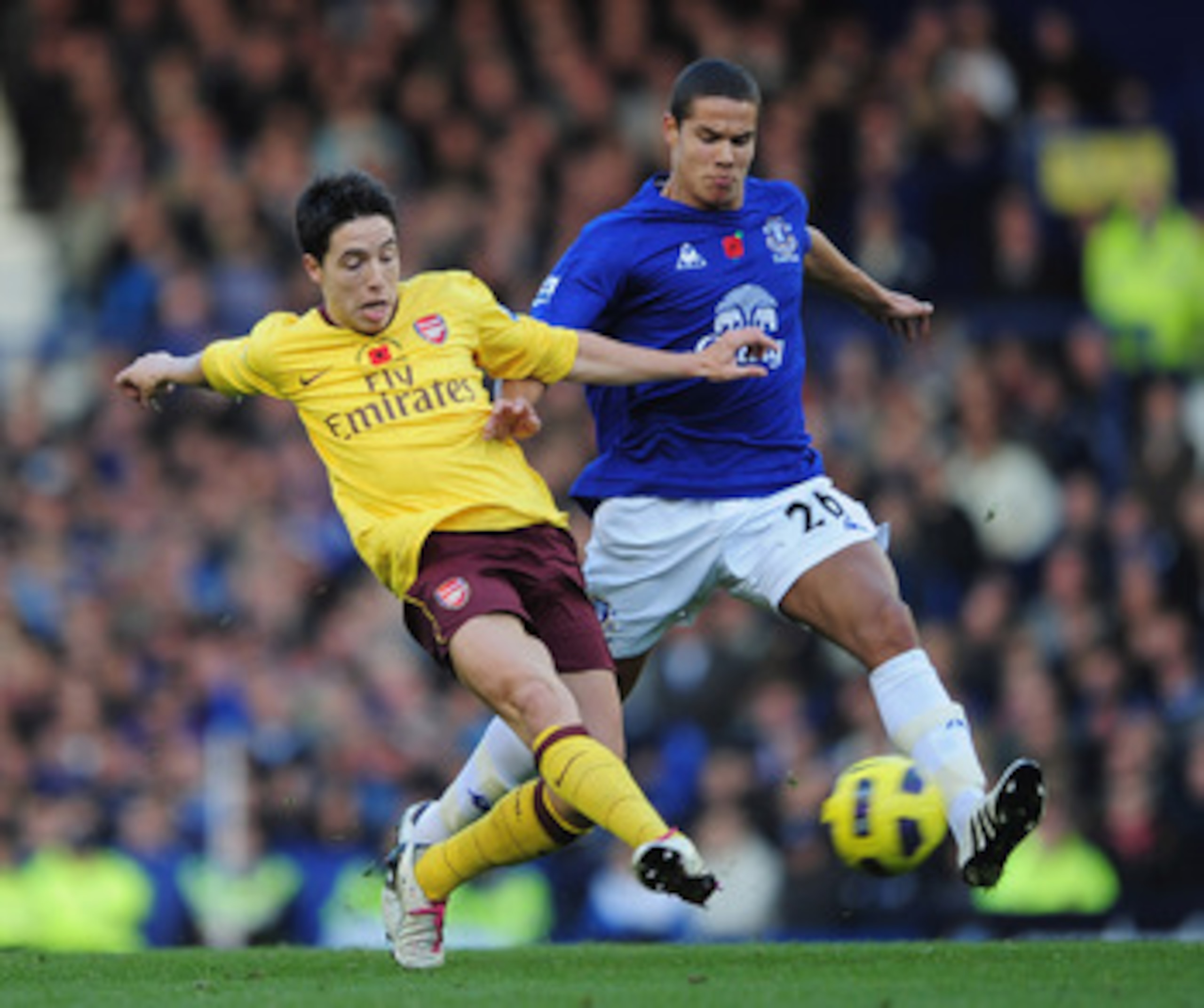 LIVERPOOL, ENGLAND - NOVEMBER 14:  Samir Nasri of Arsenal is challenged by Jack Rodwell of Everton during the Barclays Premier League match between Everton and Arsenal at Goodison Park on November 14, 2010 in Liverpool, England.  (Photo by Shaun Botterill