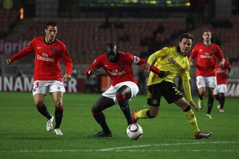 PARIS - NOVEMBER 04:  Mario Gotze (r) of Borussia challenged by Zoumana Camara of PSG during the UEFA Europa League Group J match between Paris Saint Germain and Borussia Dortmund at the Parc des Princes on November 4, 2010 in Paris, France.  (Photo by Mi