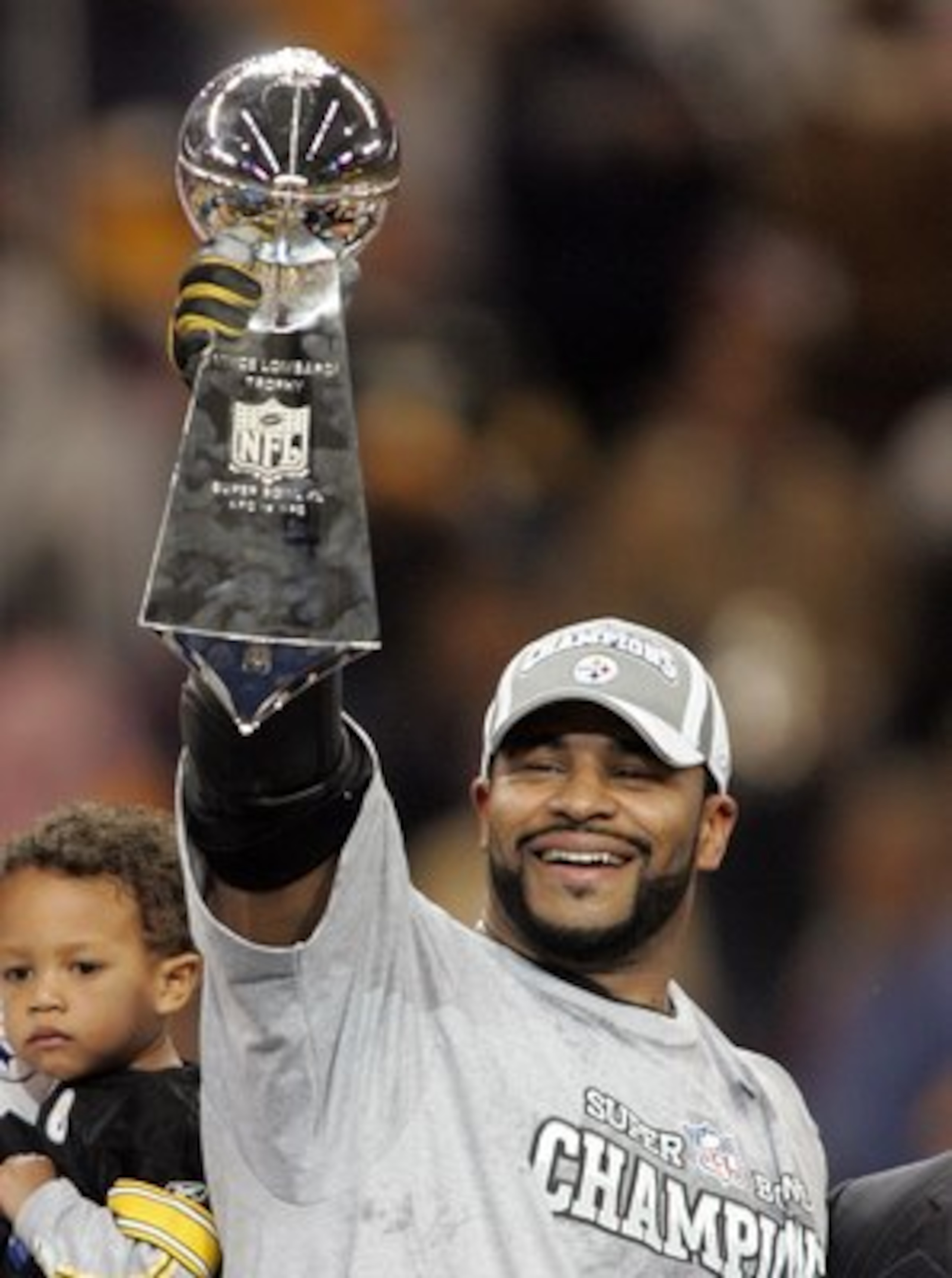 DETROIT - FEBRUARY 5: Running back Jerome Bettis #36 of the Pittsburgh Steelers celebrates with the Vince Lombardi Tropy after defeating the Seattle Seahawks in Super Bowl XL at Ford Field on February 5, 2006 in Detroit, Michigan. Bettis announced his ret