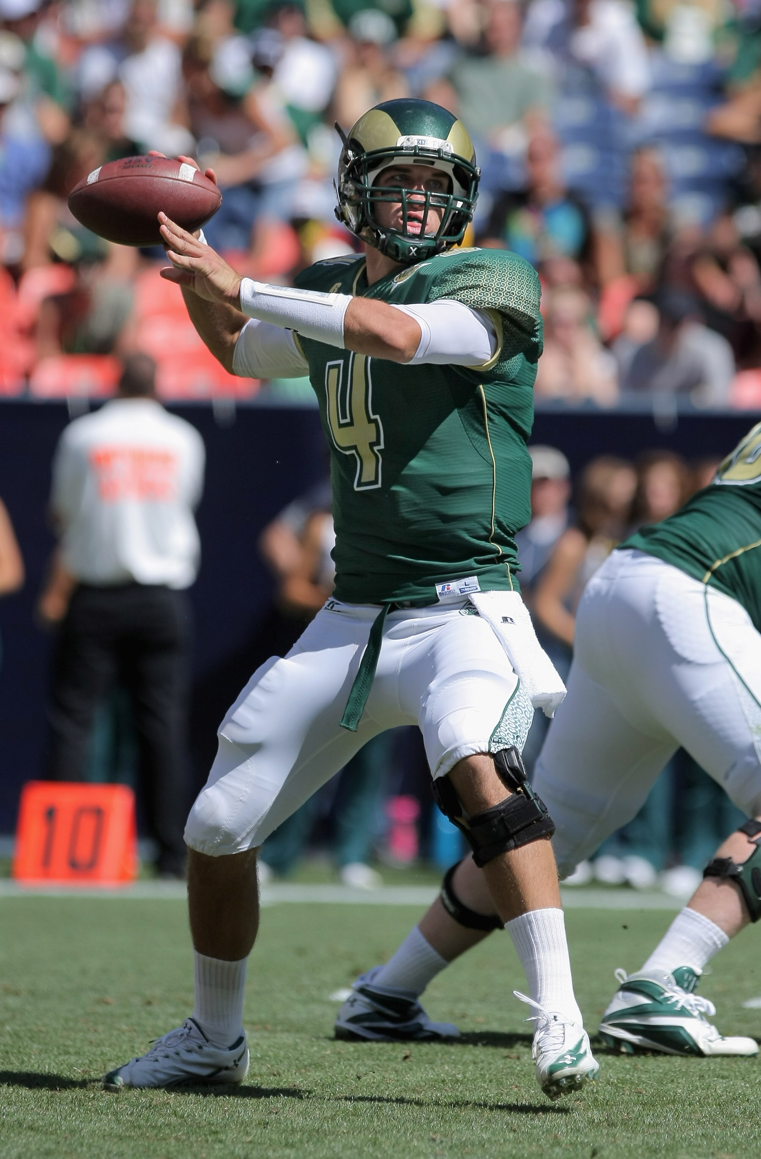 DENVER - SEPTEMBER 04:  Quarterback Pete Thomas #4 of the Colorado State Rams delivers a pass against the Colorado Buffaloes during the the Rocky Mountain Showdown at INVESCO Field at Mile High on September 4, 2010 in Denver, Colorado. Colorado was awarde