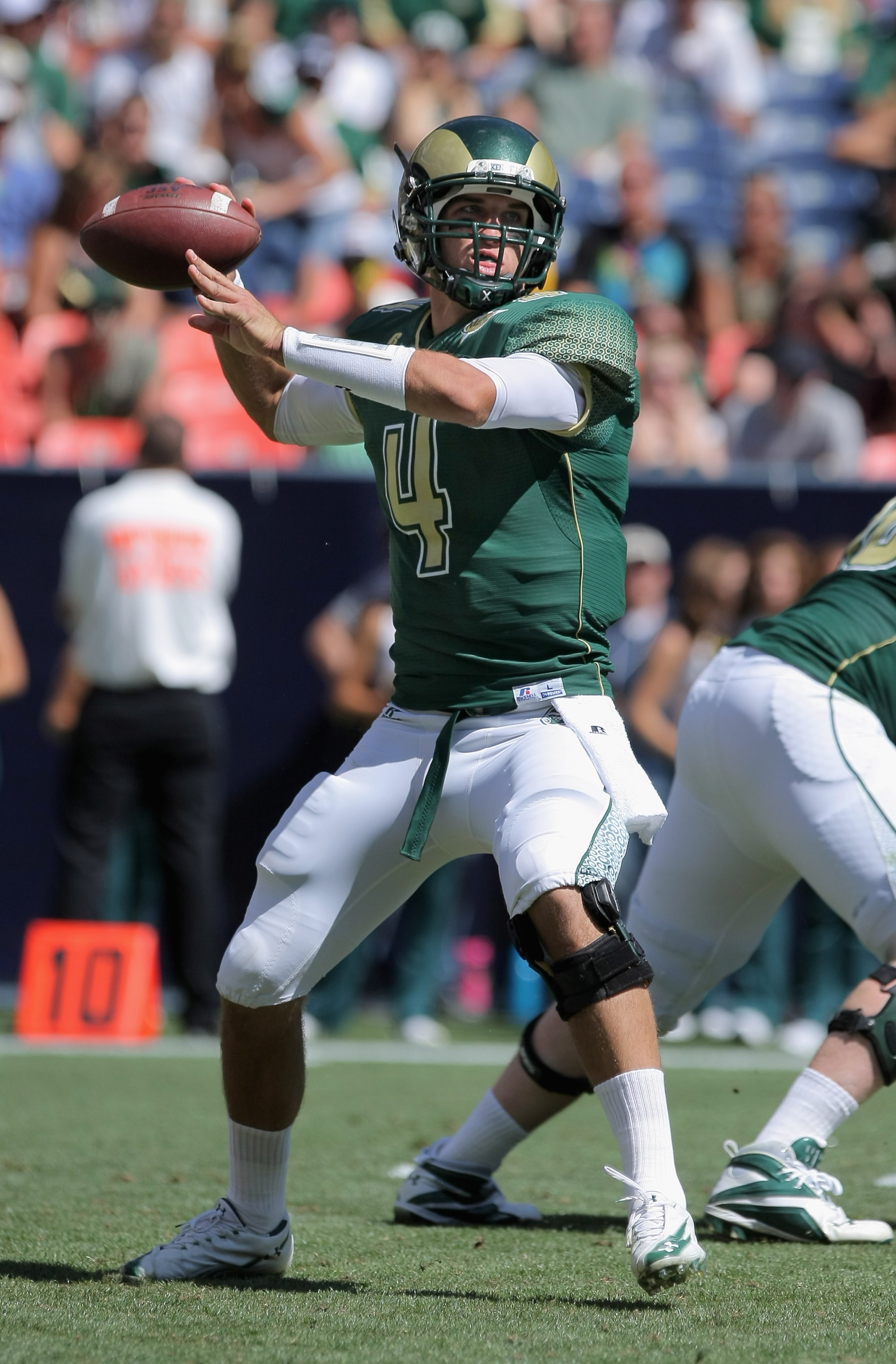 DENVER - SEPTEMBER 04:  Quarterback Pete Thomas #4 of the Colorado State Rams delivers a pass against the Colorado Buffaloes during the the Rocky Mountain Showdown at INVESCO Field at Mile High on September 4, 2010 in Denver, Colorado. Colorado was awarde