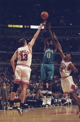 13 May, 1998:  Luc Longley #13 and Scottie Pippen #31 of the Chicago Bulls go up against Glen Rice #41 of the Charlotte Hornets for the ball during the NBA Eastern Conference Finals at the United Center in Chicago, Illinois.  The Bulls defeated the Hornet