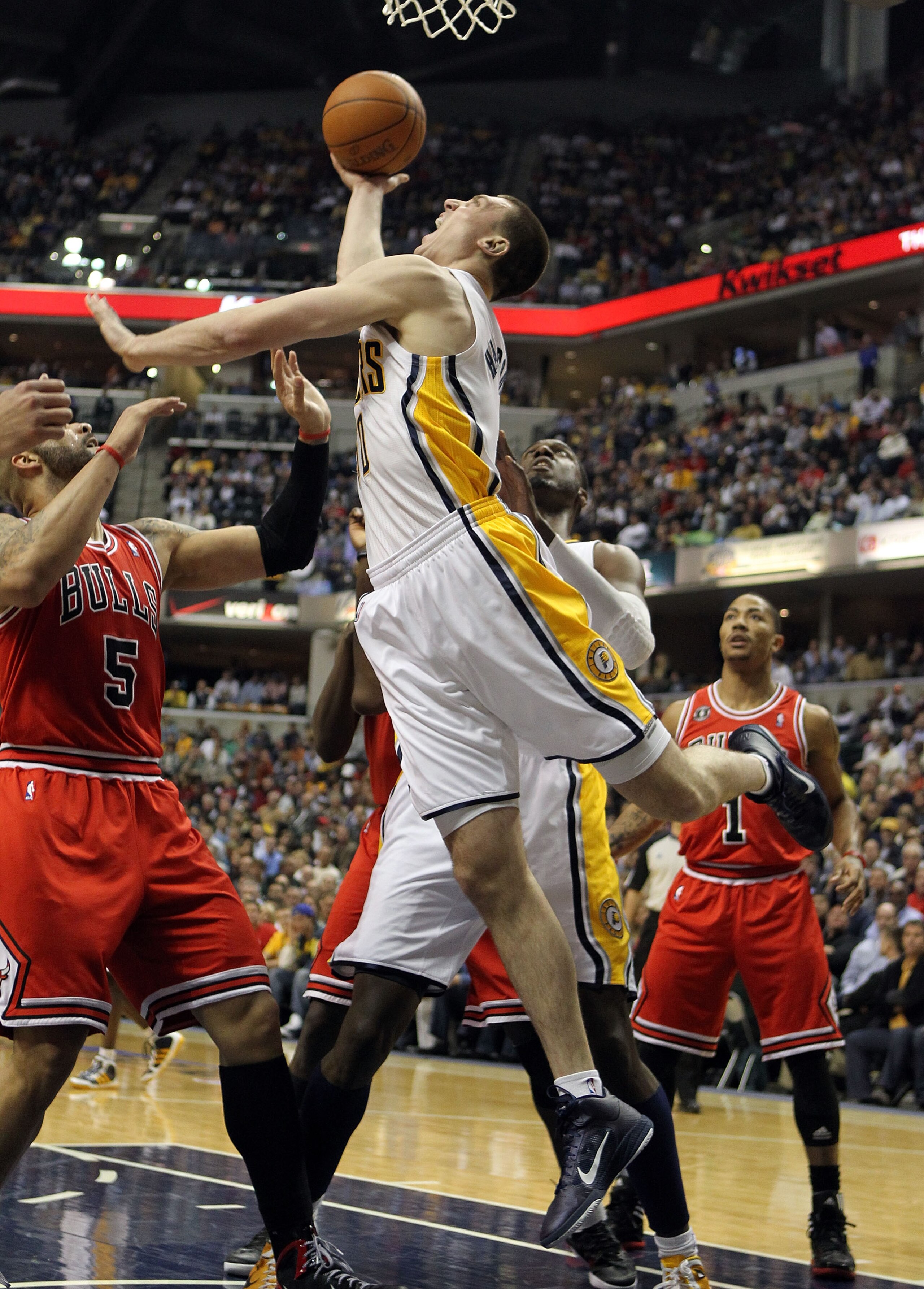 INDIANAPOLIS, IN - APRIL 21:  Tyler Hansbrough #50 of the Indiana Pacers shoots the ball against the Chicago Bulls in Game three of the Eastern Conference Quarterfinals in the 2011 NBA Playoffs on April 21, 2011  at Conseco Fieldhouse in Indianapolis, Ind