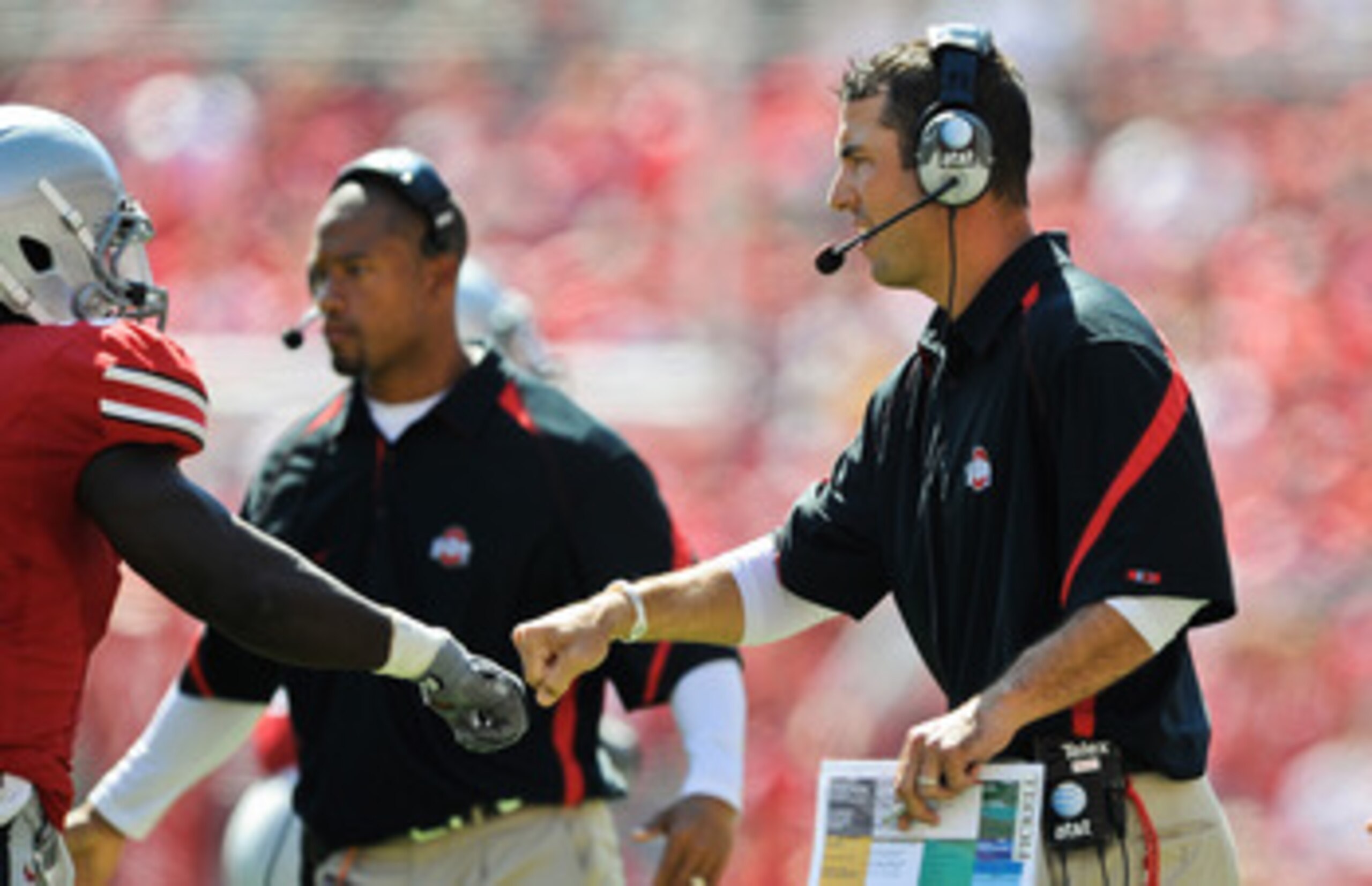 COLUMBUS, OH - SEPTEMBER 18:  Assistant Coach Luke Fickell of the Ohio State Buckeyes fists pump one of his players during a game against the Ohio Bobcats at Ohio Stadium on September 18, 2010 in Columbus, Ohio.  (Photo by Jamie Sabau/Getty Images)