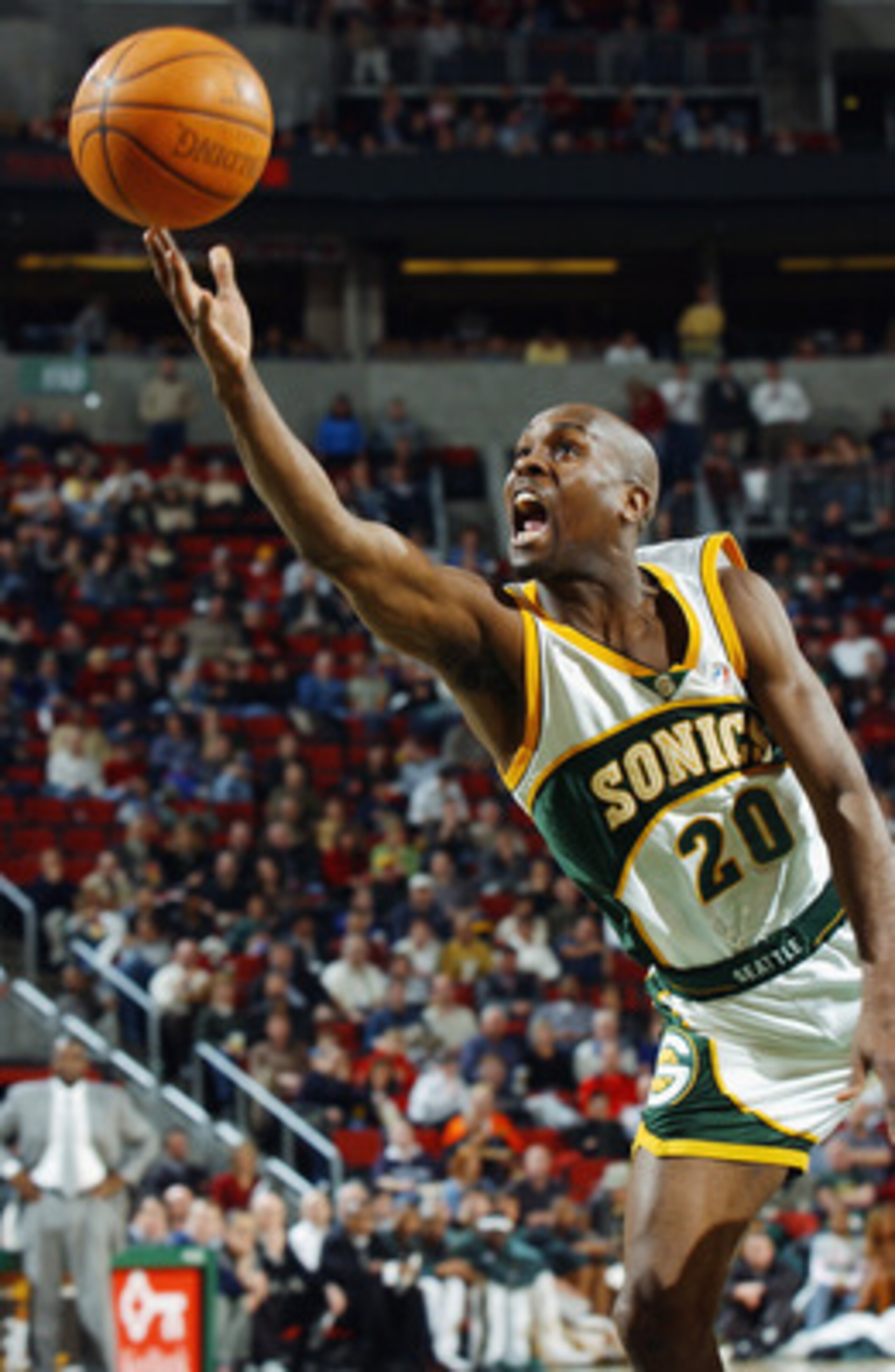 SEATTLE - FEBRUARY 11:  Gary Payton #20 of the Seattle Sonics puts up a shot during the game against the Boston Celtics at Key Arena on February 11, 2003 in Seattle, Washington.  The Celtics won 82-76.  NOTE TO USER: User expressly acknowledges and agrees