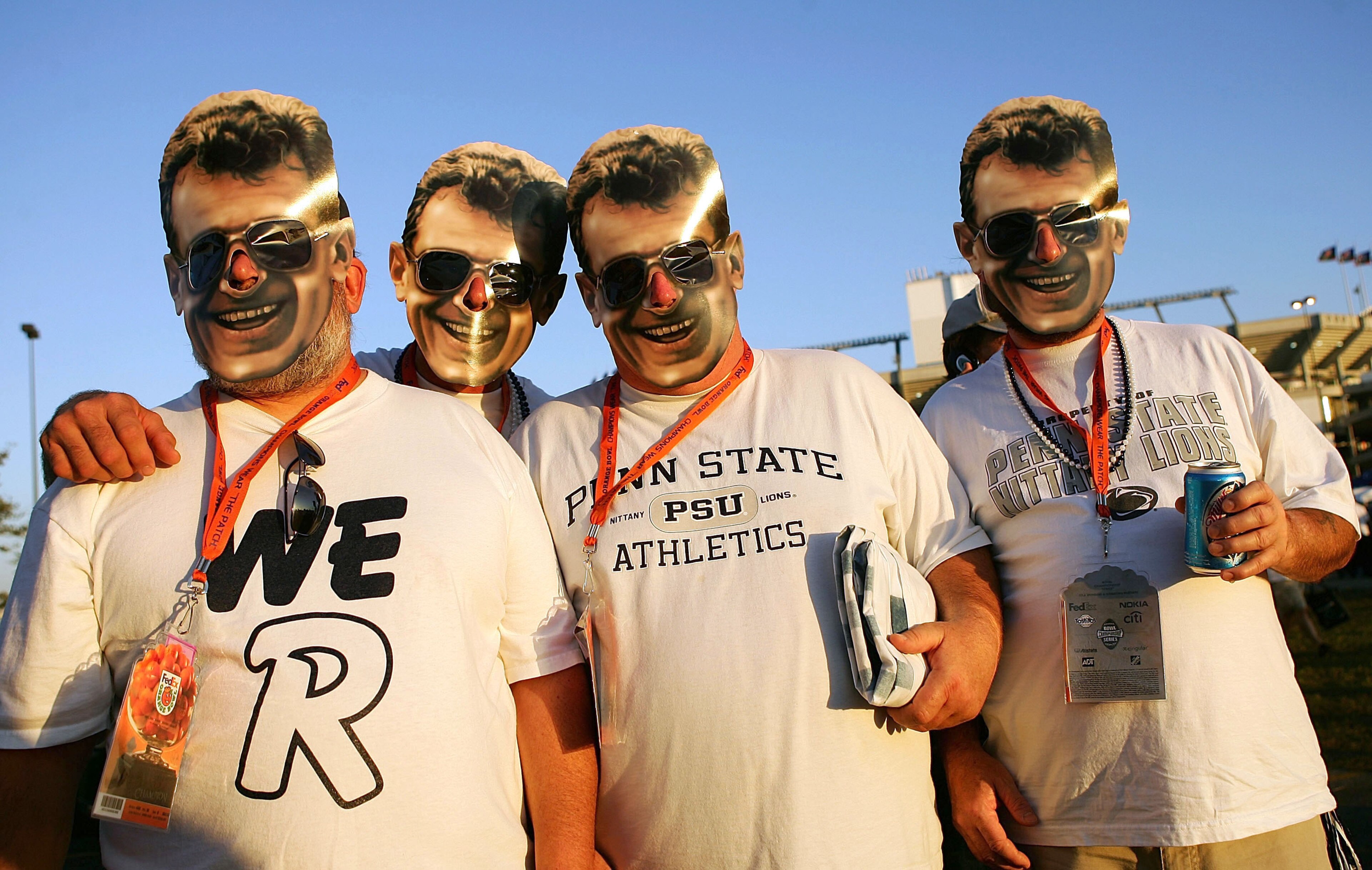 MIAMI - JANUARY 03:  Penn State Nittany Lions fans pose with head coach Joe Paterno masks as they tailgate prior to the start of the FedEx Orange Bowl between the Penn State Nittany Lions and the Florida State Seminoles on January 3, 2006 at Dolphins Stad