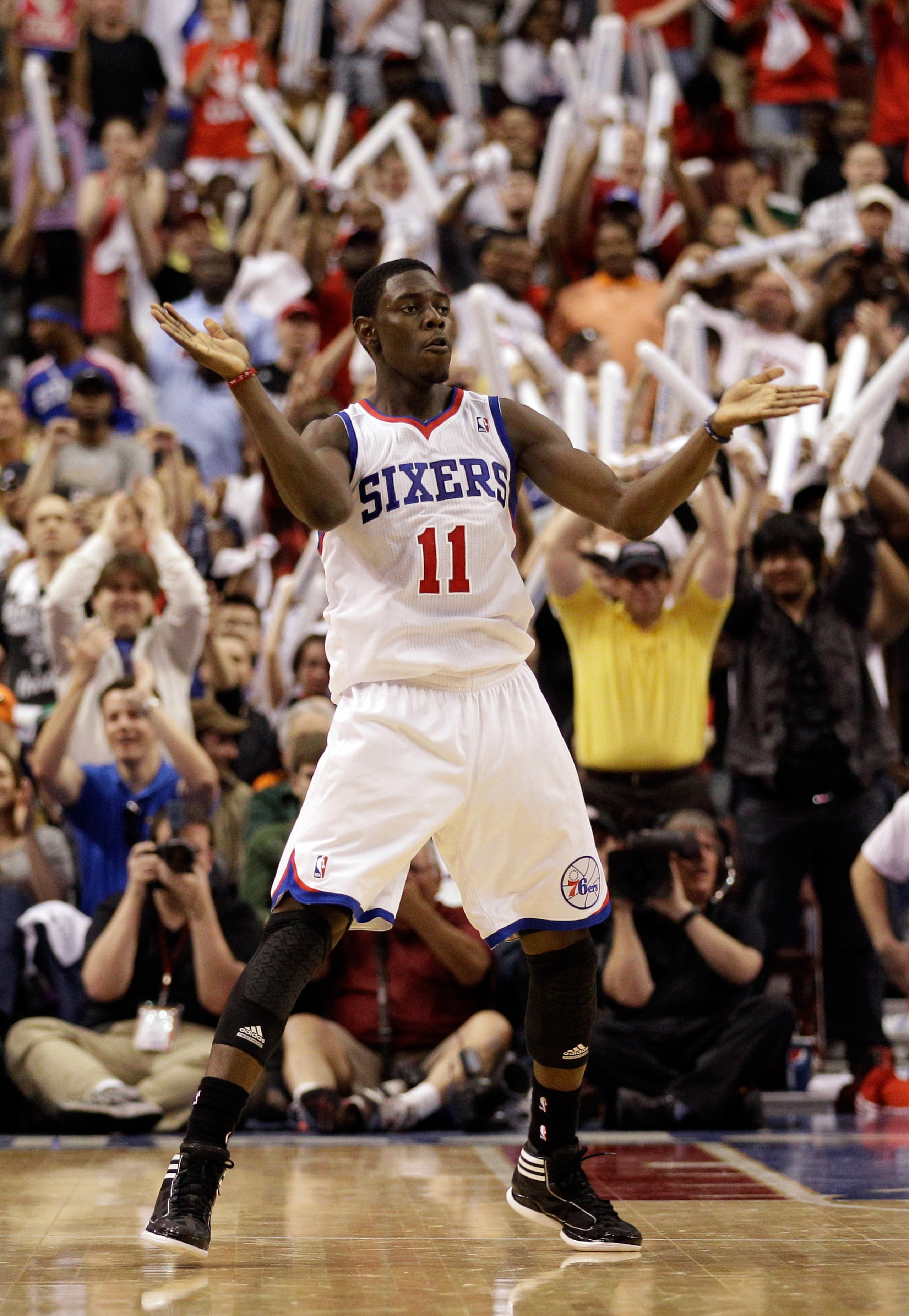 PHILADELPHIA, PA - APRIL 24: Jrue Holiday #11 of the Philadelphia 76ers celebrates after scoring against the Miami Heat in the fourth quarter of Game Four of the Eastern Conference Quarterfinals in the 2011 NBA Playoffs at Wells Fargo Center on April 24,