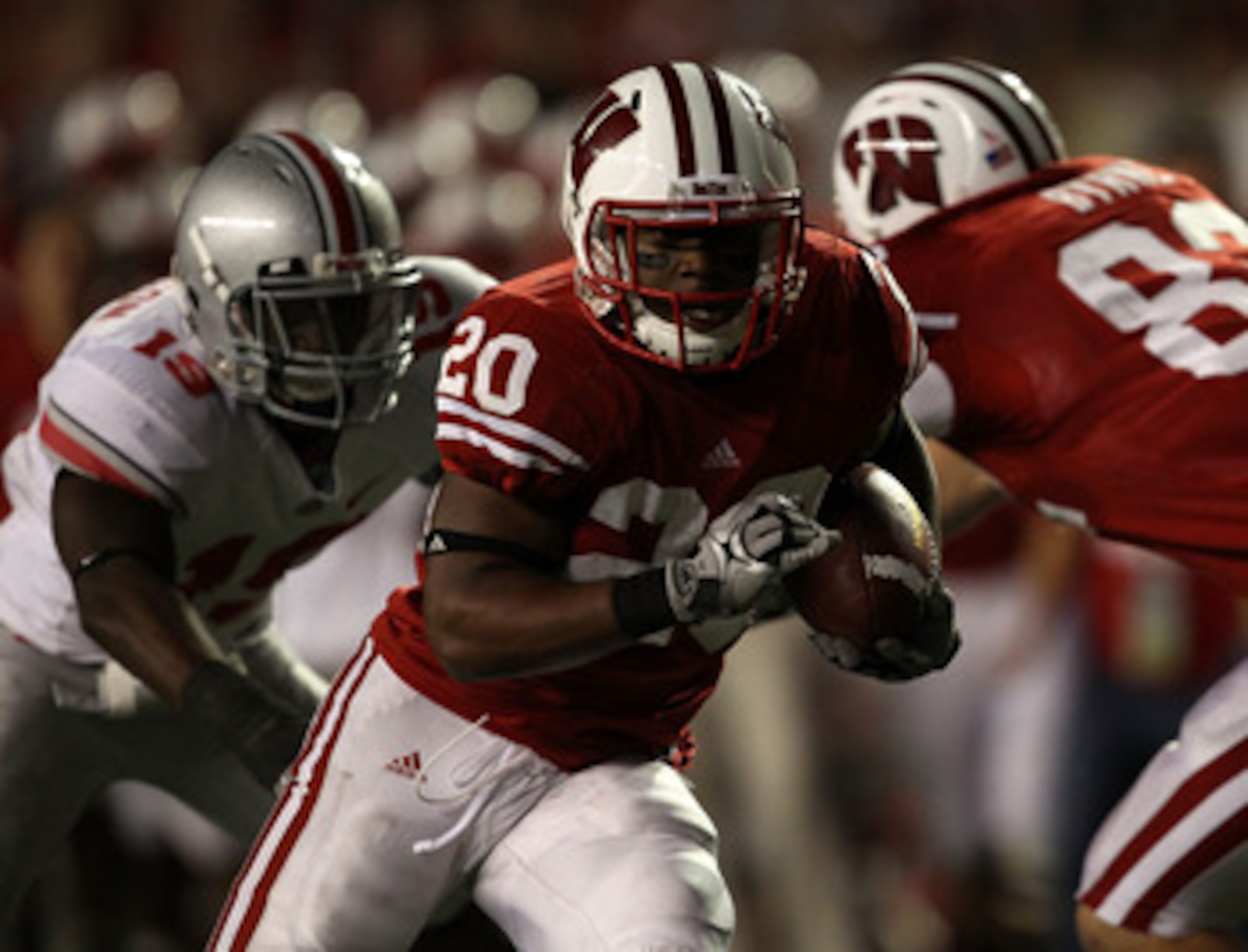MADISON, WI - OCTOBER 16: James White #20 of the Wisconsin Badgers rushes for a touchdown against the Ohio State Buckeyes at Camp Randall Stadium on October 16, 2010 in Madison, Wisconsin. Wisconsin defeated Ohio State 31-18. (Photo by Jonathan Daniel/Get