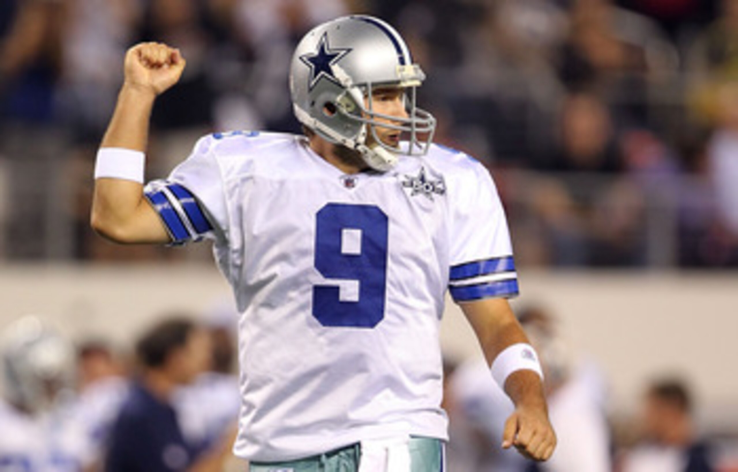 ARLINGTON, TX - OCTOBER 25: Quarterback Tony Romo #9 of the Dallas Cowboys celebrates a touchdown by Jason Witten against the New York Giants in the first quarter at Cowboys Stadium on October 25, 2010 in Arlington, Texas. (Photo by Ronald Martinez/Gett ARLINGTON, TX - OCTOBER 25: Quarterback Tony Romo #9 of the Dallas Cowboys celebrates a touchdown by Jason Witten against the New York Giants in the first quarter at Cowboys Stadium on October 25, 2010 in Arlington, Texas. (Photo by Ronald Martinez/Gett