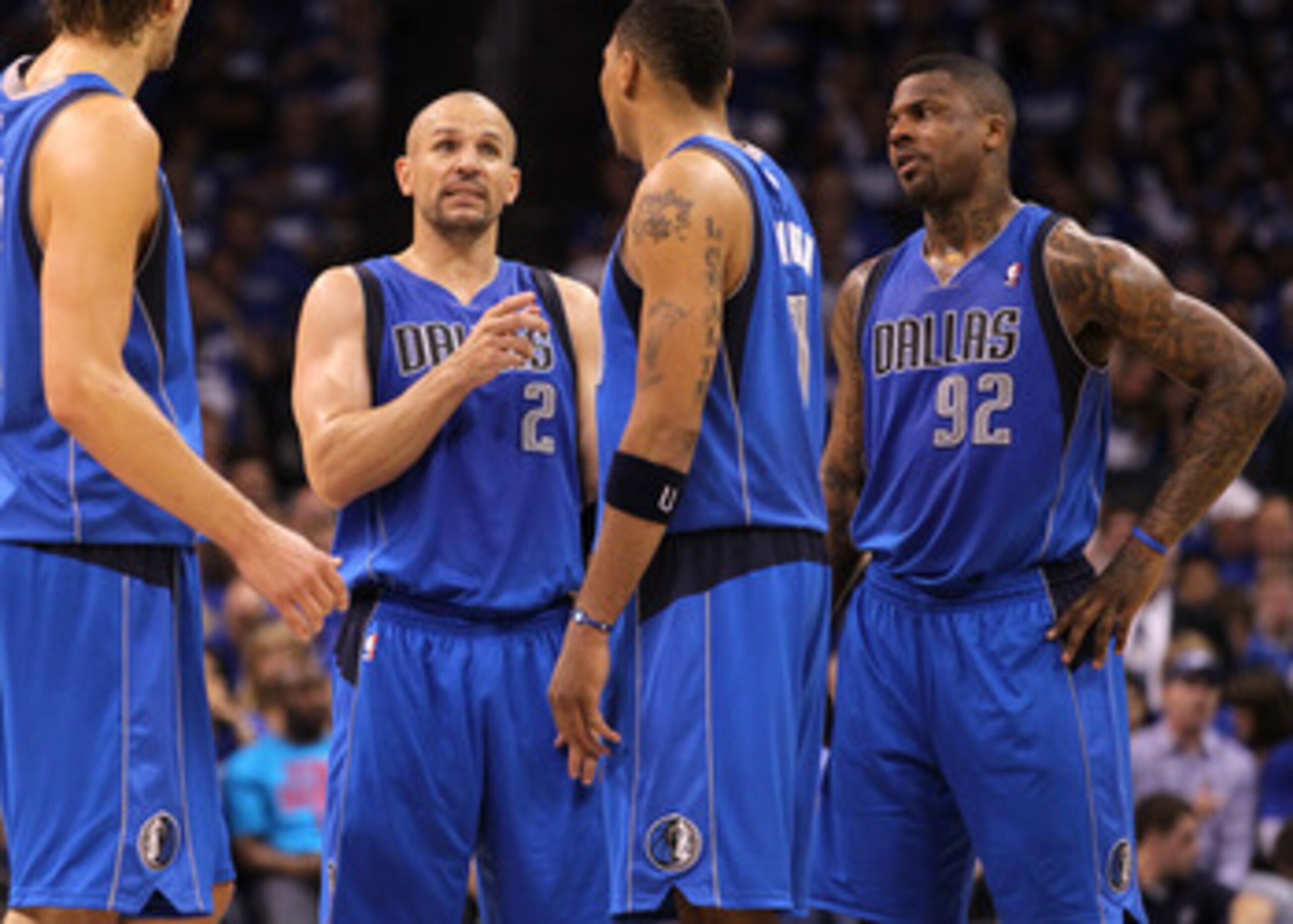 OKLAHOMA CITY, OK - MAY 21:  (C) Jason Kidd #2 of the Dallas Mavericks talks with teammates Jason Terry #31, Dirk Nowitzki #41, Shawn Marion #0 and DeShawn Stevenson #92 while taking on the Oklahoma City Thunder in Game Three of the Western Conference Fin