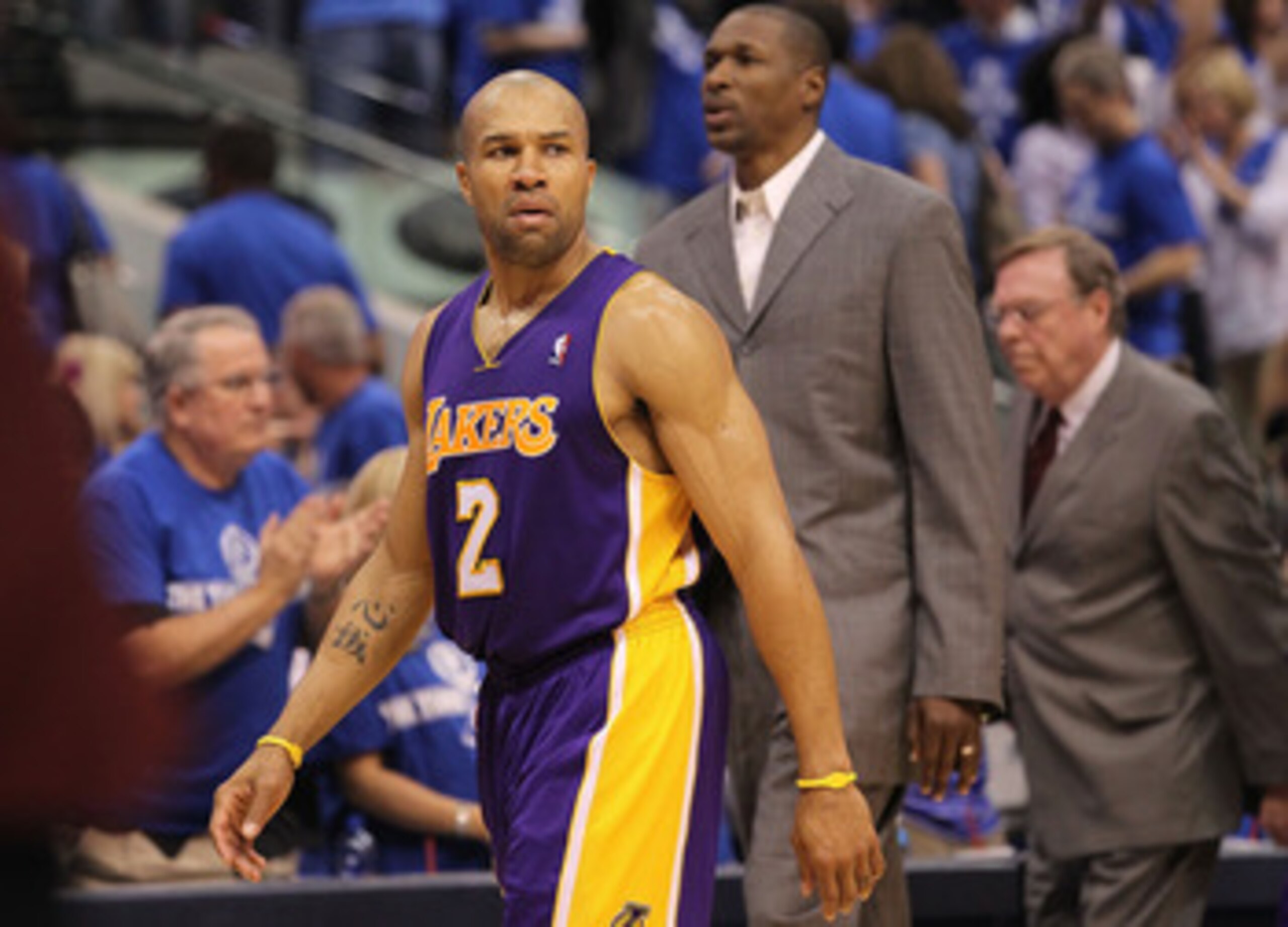 DALLAS, TX - MAY 06:  Guard Derek Fisher #2 of the Los Angeles Lakers leaves the court after a 98-92 loss against the Dallas Mavericks in Game Three of the Western Conference Semifinals during the 2011 NBA Playoffs on May 6, 2011 at American Airlines Cent