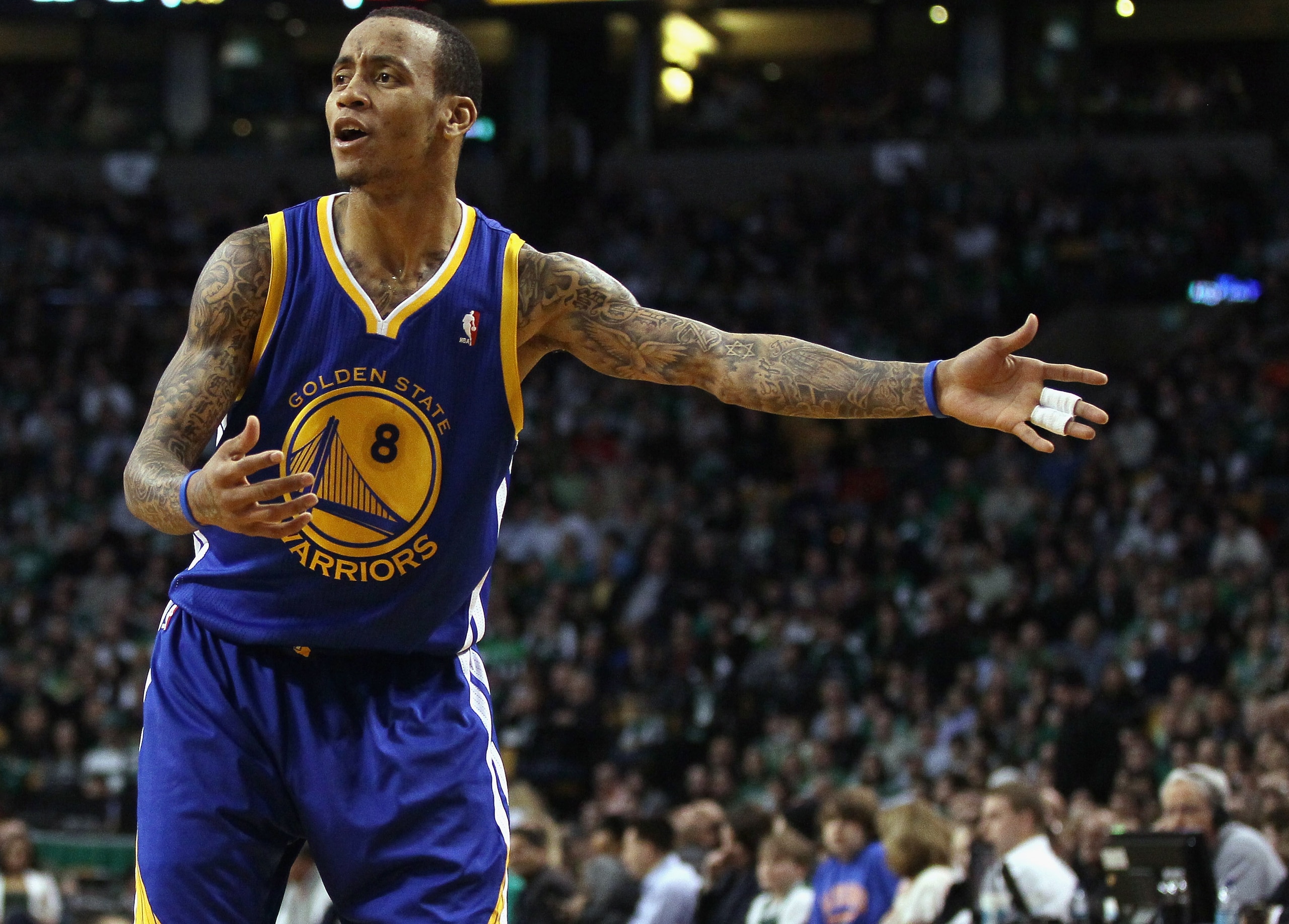 BOSTON, MA - MARCH 04:  Monta Ellis #8 of the Golden State Warriors reacts after the ball is given to the Boston Celtics on March 4, 2011 at the TD Garden in Boston, Massachusetts.  The Celtics defeated the Warriors 107-103. NOTE TO USER: User expressly a