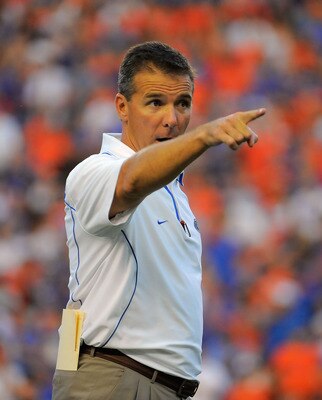 GAINESVILLE, FL - SEPTEMBER 25:  Head coach Urban Meyer of the Florida Gators directs his team while taking on the Kentucky Wildcats at Ben Hill Griffin Stadium on September 25, 2010 in Gainesville, Florida. Florida defeated Kentucky 48-14 for Meyer's 100