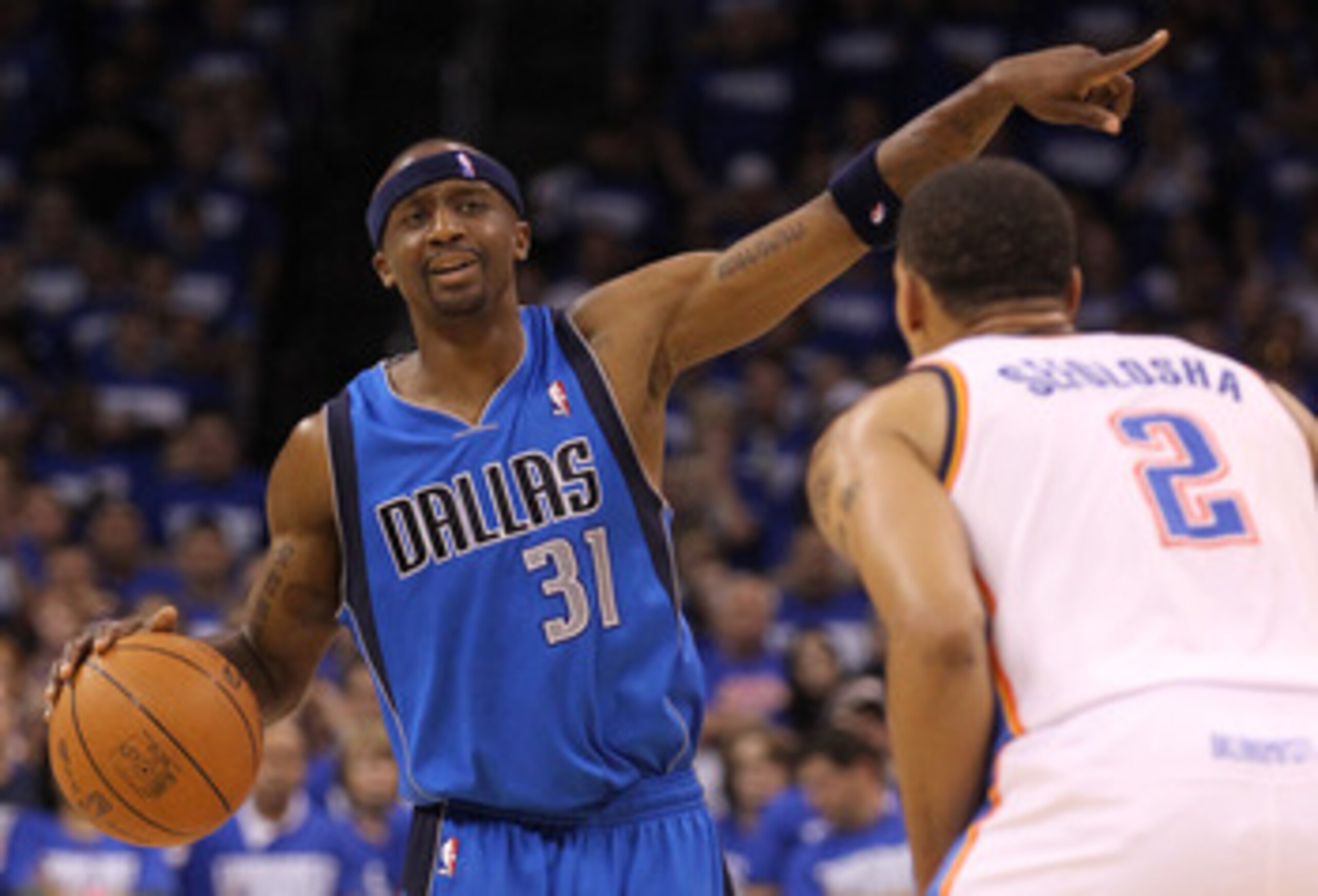 OKLAHOMA CITY, OK - MAY 21:  Jason Terry #31 of the Dallas Mavericks calls out while being guarded by Thabo Sefolosha #2 of the Oklahoma City Thunder in the third quarter in Game Three of the Western Conference Finals during the 2011 NBA Playoffs at Oklah