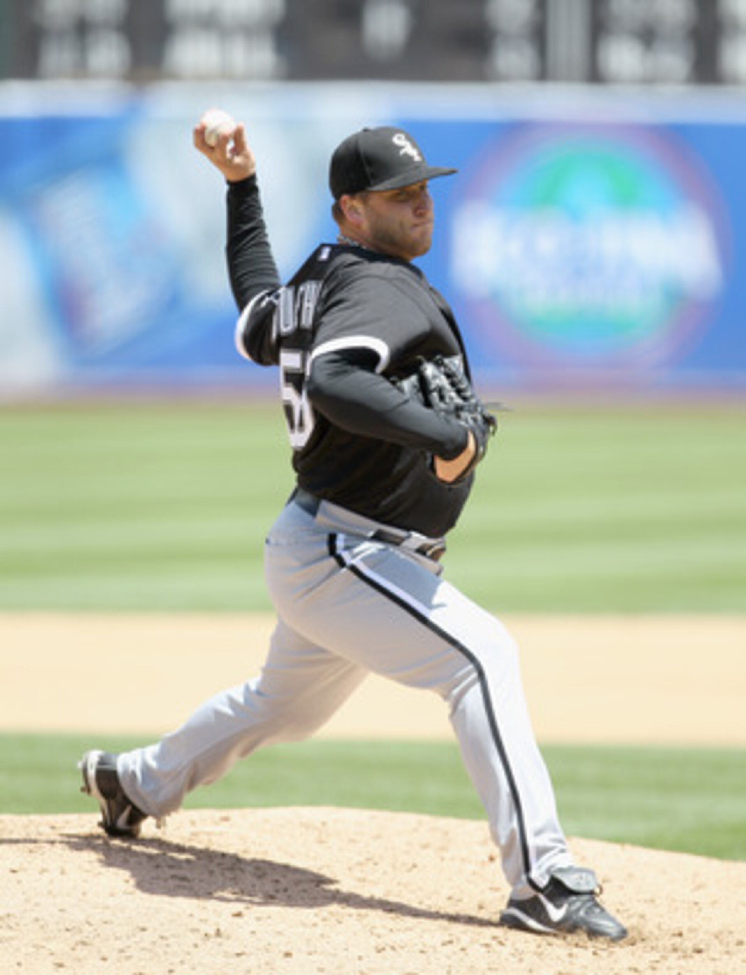 OAKLAND, CA - MAY 15:  Mark Buehrle #56 of the Chicago White Sox pitches against the Oakland Athletics at Oakland-Alameda County Coliseum on May 15, 2011 in Oakland, California.  (Photo by Ezra Shaw/Getty Images)