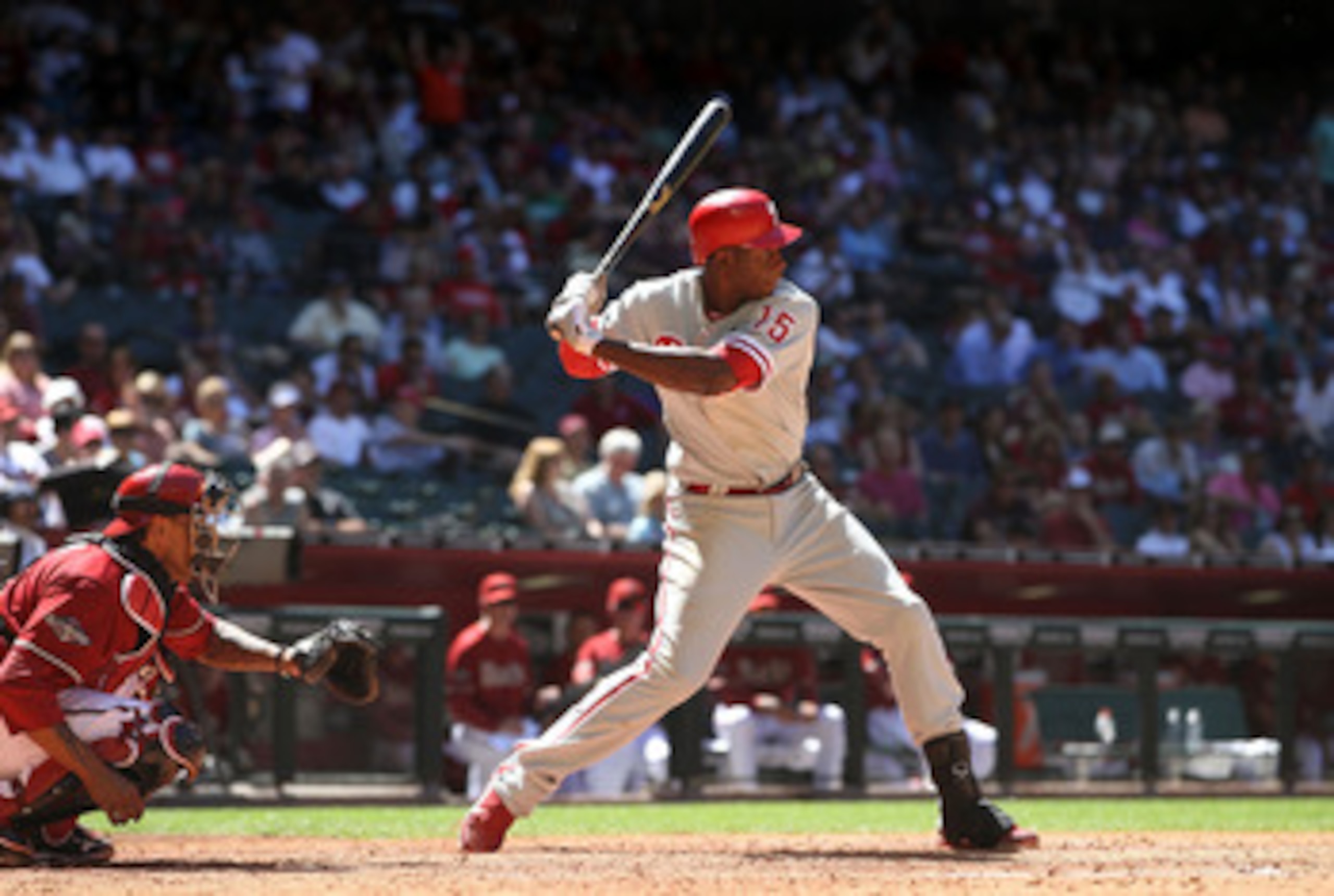 PHOENIX, AZ - APRIL 27:  John Mayberry #15 of the Philadelphia Phillies bats against the Arizona Diamondbacks during the Major League Baseball game at Chase Field on April 27, 2011 in Phoenix, Arizona.  The Phillies defeated the Diamondbacks 8-4.  (Photo 