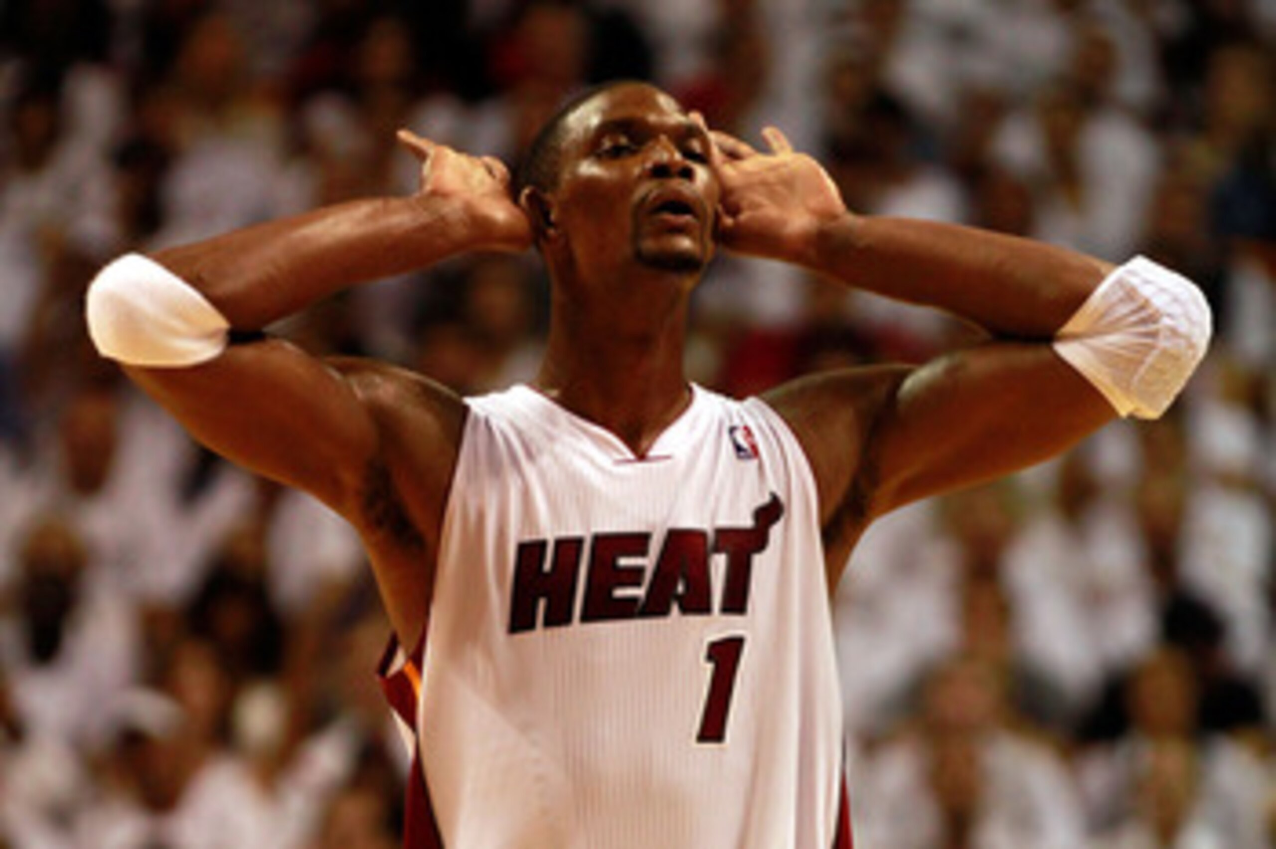 MIAMI, FL - MAY 24:  Chris Bosh #1 of the Miami Heat reacts against the Chicago Bulls in Game Four of the Eastern Conference Finals during the 2011 NBA Playoffs on May 24, 2011 at American Airlines Arena in Miami, Florida. NOTE TO USER: User expressly ack