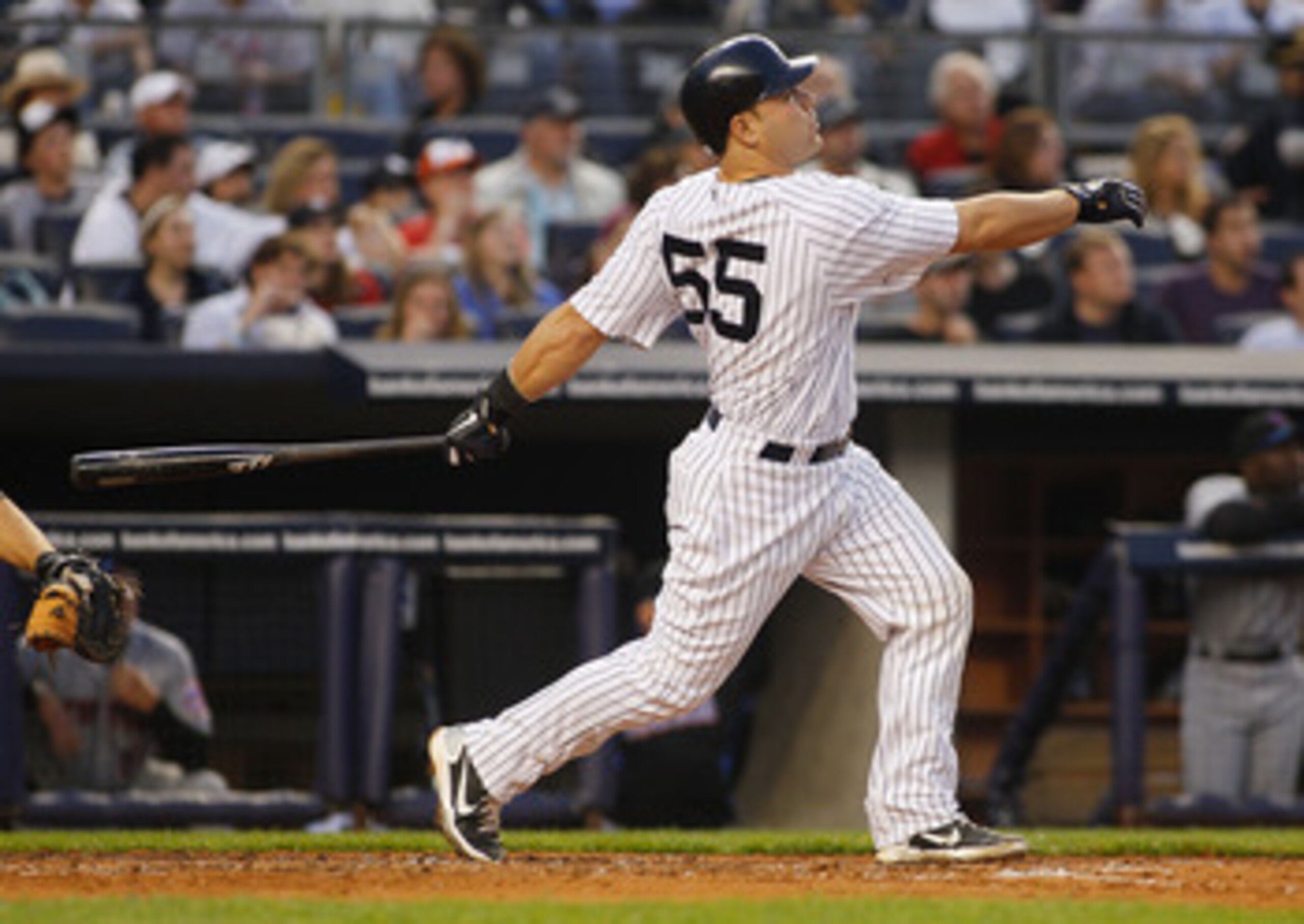 NEW YORK - MAY 21:  Russell Martin #55 of the New York Yankees watches his two run home run in the bottom of the second inning against the New York Mets on May 21, 2011 at Yankee Stadium in the Bronx borough of New York City.  (Photo by Mike Stobe/Getty I