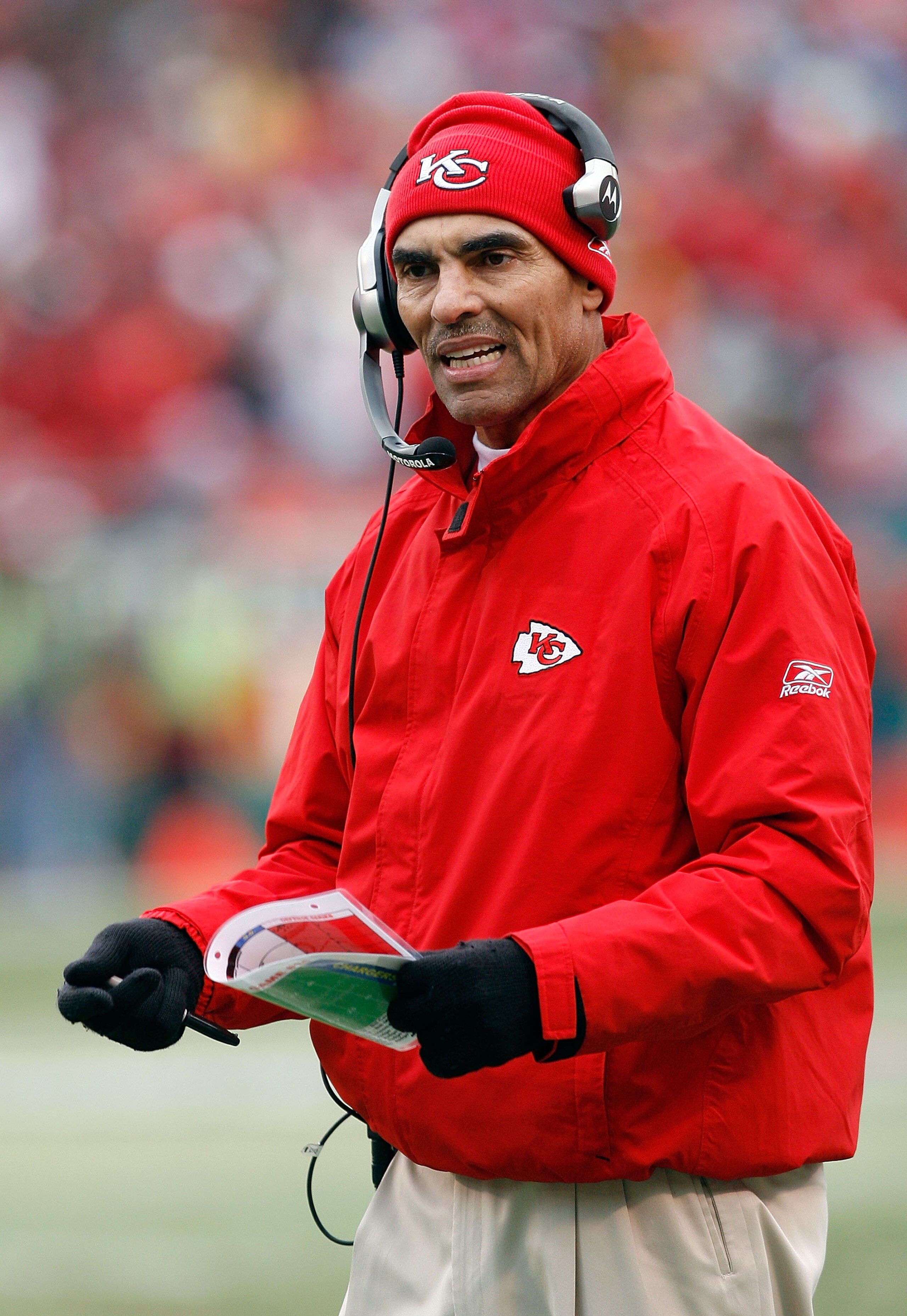 KANSAS CITY, MO - DECEMBER 14:  Head Coach Herm Edwards of the Kansas City Chiefs challenges a call against the San Diego Chargers during the first half on December 14, 2008 at Arrowhead Stadium in Kansas City, Missouri.  (Photo by Harry How/Getty Images)
