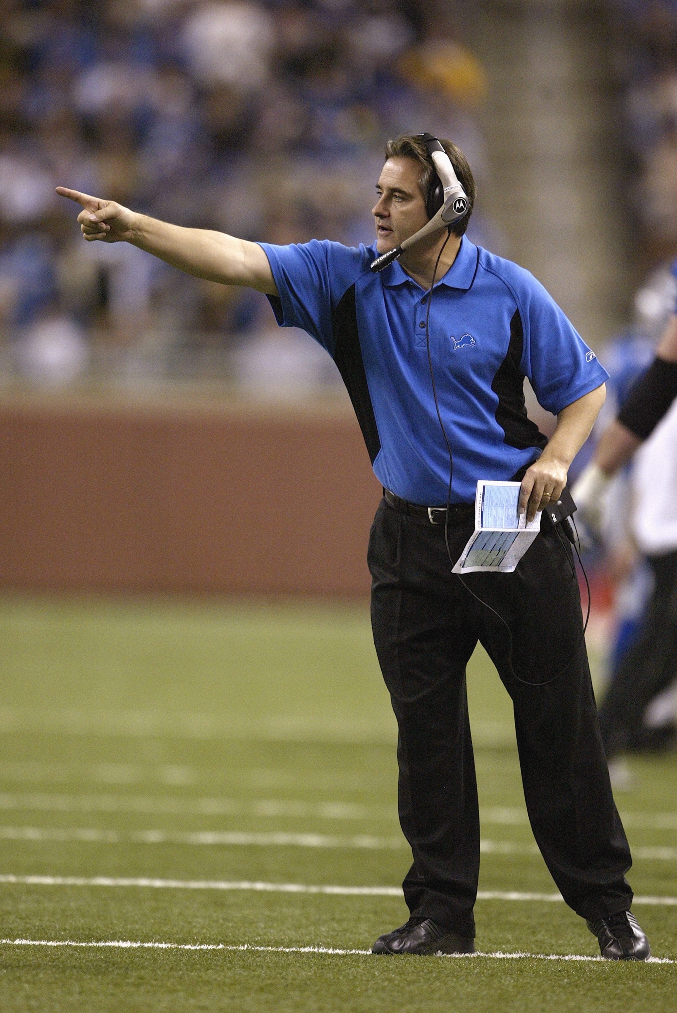 DETROIT - DECEMBER 5:  Head coach Steve Mariucci of the Detroit Lions gestures from the sideline during the game against the Arizona Cardinals at Ford Field on December 5, 2004 in Detroit, Michigan. Jones rushed for 196 yards. The Lions won the game, 26-1