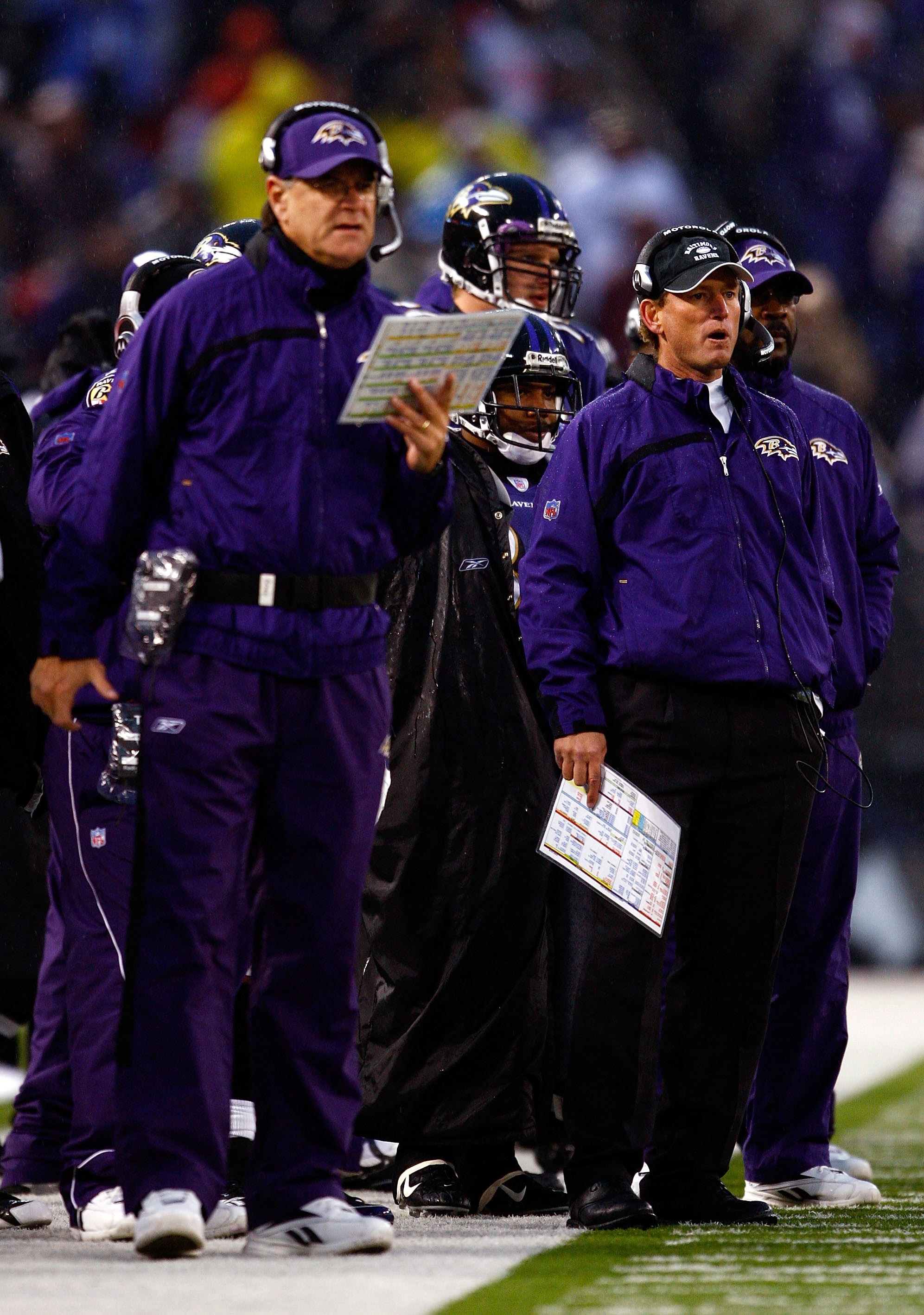 BALTIMORE - DECEMBER 30:  Offensive coordinator Rick Neuheisel of the Baltimore Ravens watches the action alongside head coach Brian Billick during the game against the Pittsburgh Steelers at M&T Bank Stadium December 30, 2007 in Baltimore, Maryland.  (Ph